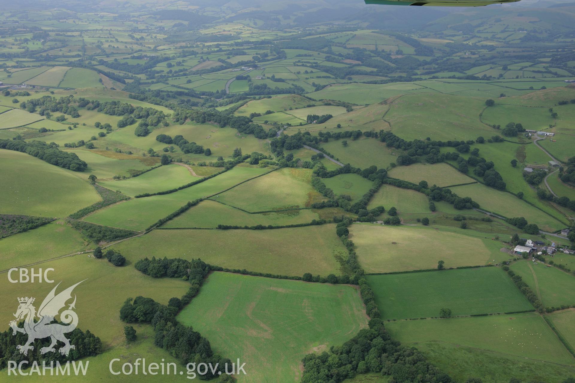 Pen-Rhiw-Dalar Roman Road, north west of Builth Wells. Oblique aerial photograph taken during the Royal Commission?s programme of archaeological aerial reconnaissance by Toby Driver on 1st August 2013.