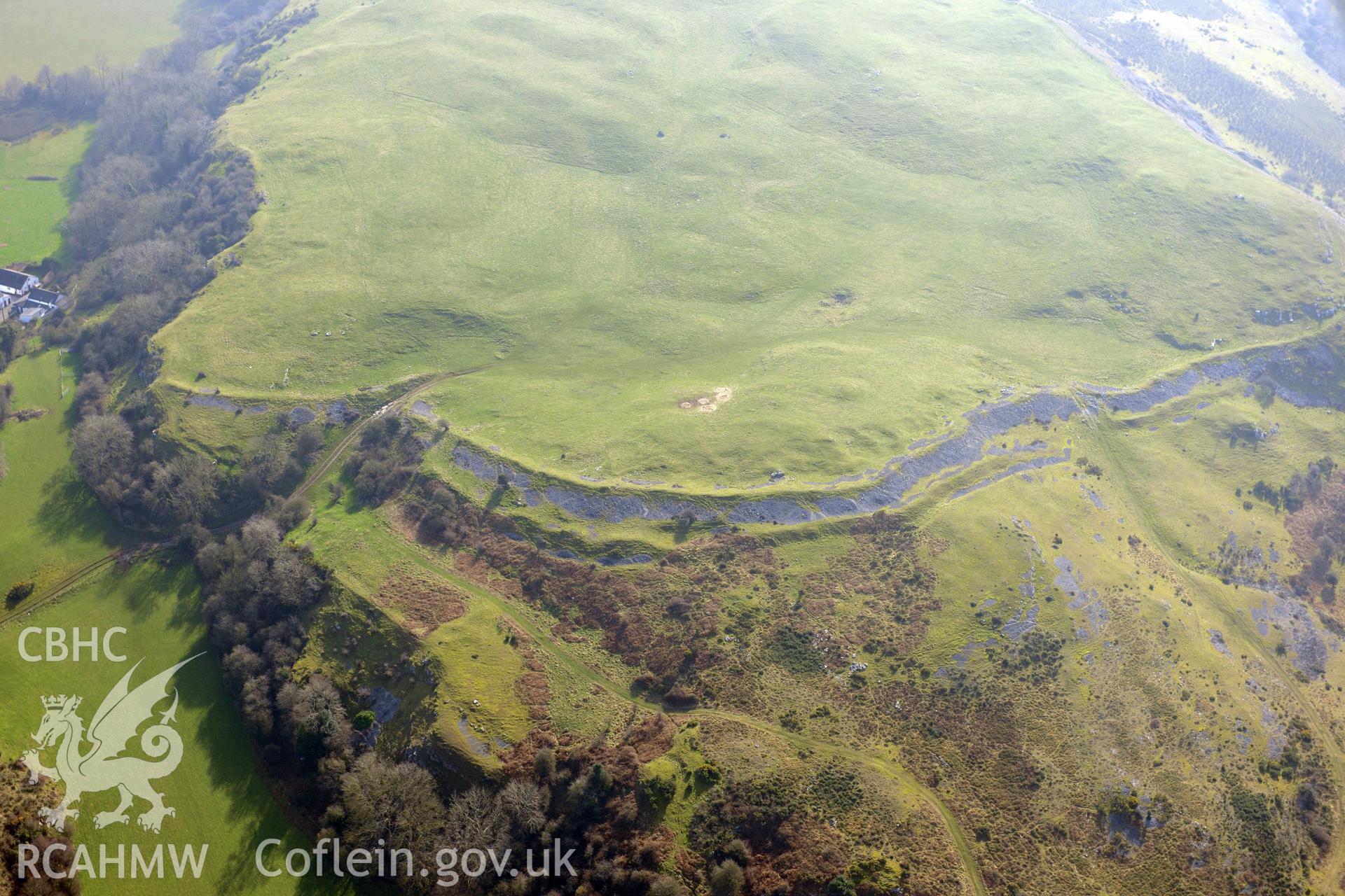 Pen-y-Corddyn-Mawr hillfort, Abergele. Oblique aerial photograph taken during the Royal Commission?s programme of archaeological aerial reconnaissance by Toby Driver on 28th February 2013.