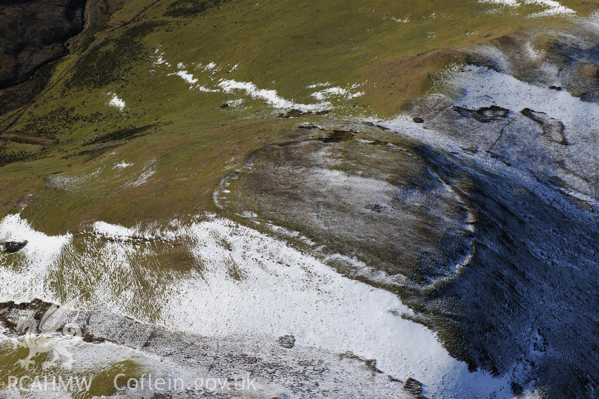 Castell Rhyfel hillfort, east of Tregaron. Oblique aerial photograph taken during the Royal Commission's programme of archaeological aerial reconnaissance by Toby Driver on 4th February 2015.