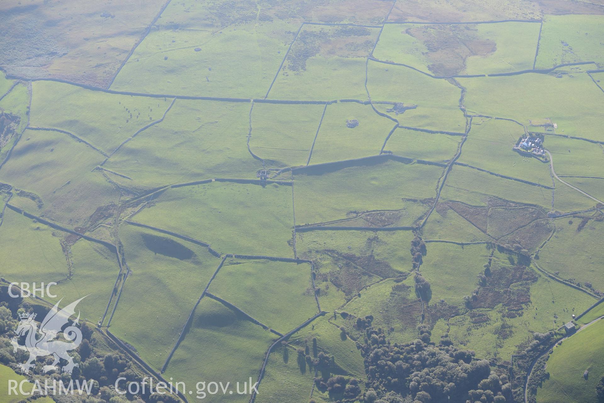 Castell y Gaer, the field system to the west of the Castell, and an enclosure north east of Carn-Gadell Uchaf. Oblique aerial photograph taken during the Royal Commission's programme of archaeological aerial reconnaissance by Toby Driver on 2nd October 2015.