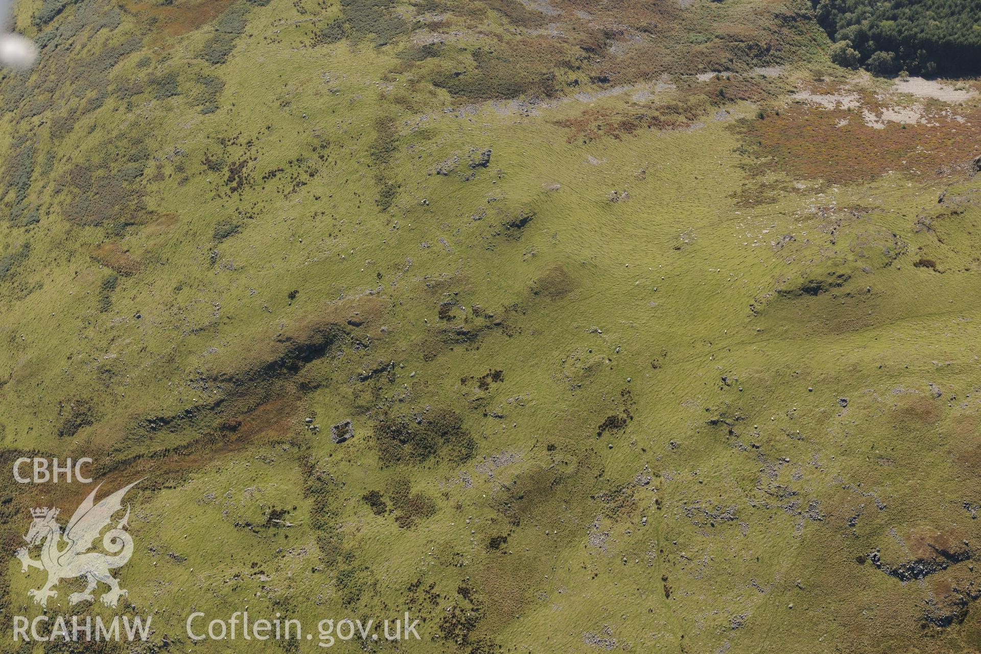 Settlement at Craig Tyn-y-Cornel, on the Esgair Berfa part of the Cadair Idris range. Oblique aerial photograph taken during the Royal Commission's programme of archaeological aerial reconnaissance by Toby Driver on 2nd October 2015.