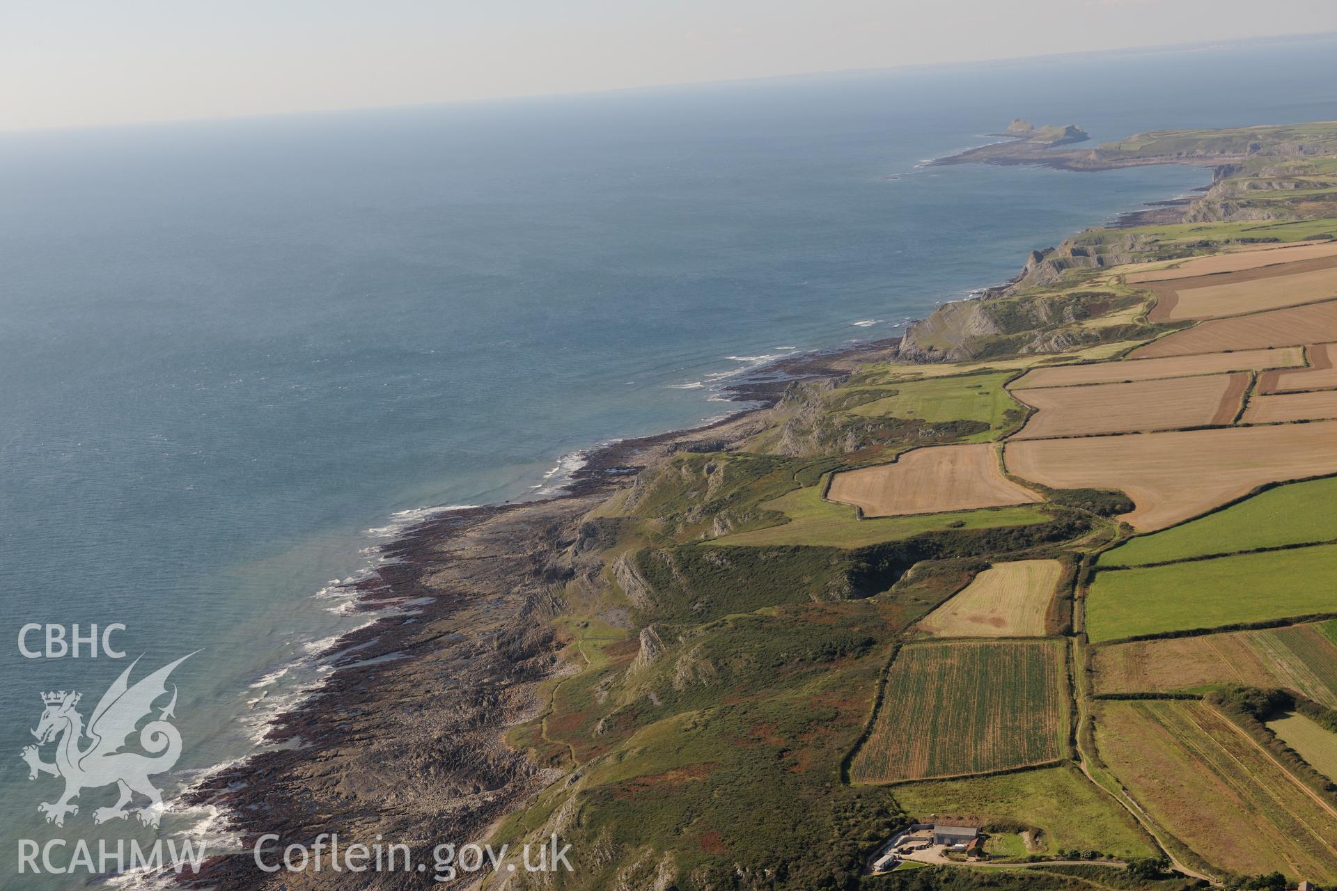 Yellow Top fort, on the south western shores of the Gower Peninsula. Oblique aerial photograph taken during the Royal Commission's programme of archaeological aerial reconnaissance by Toby Driver on 30th September 2015.