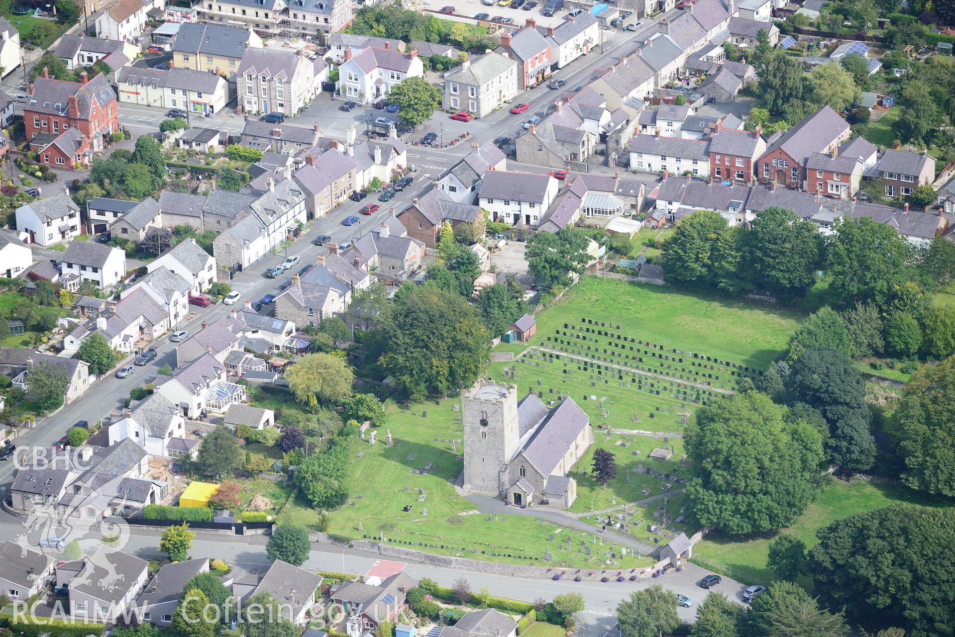 St Michael's church in the town of Caerwys, near Holywell. Oblique aerial photograph taken during the Royal Commission's programme of archaeological aerial reconnaissance by Toby Driver on 11th September 2015.