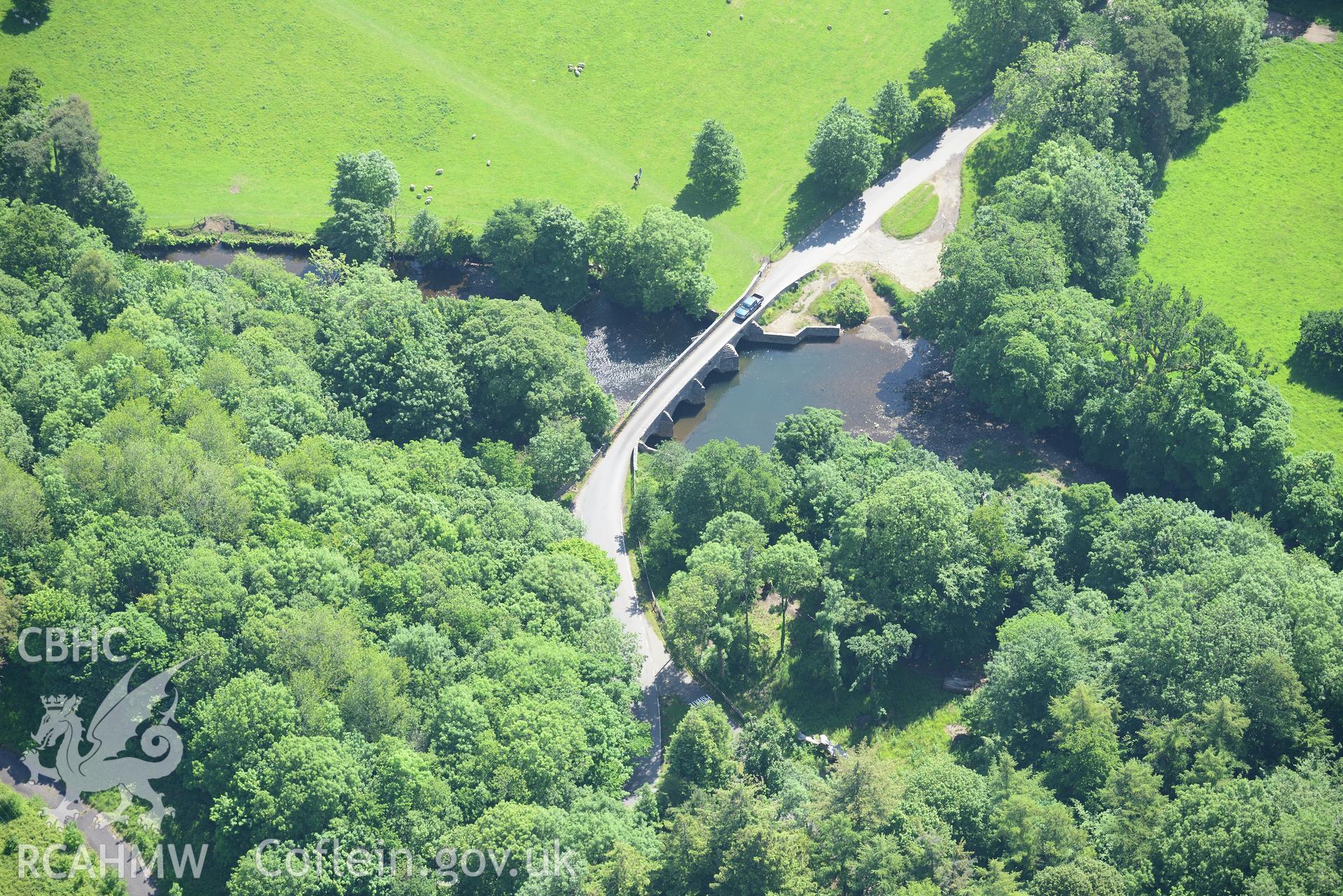 New Inn dipping bridge, Bridgend. Oblique aerial photograph taken during the Royal Commission's programme of archaeological aerial reconnaissance by Toby Driver on 19th June 2015.