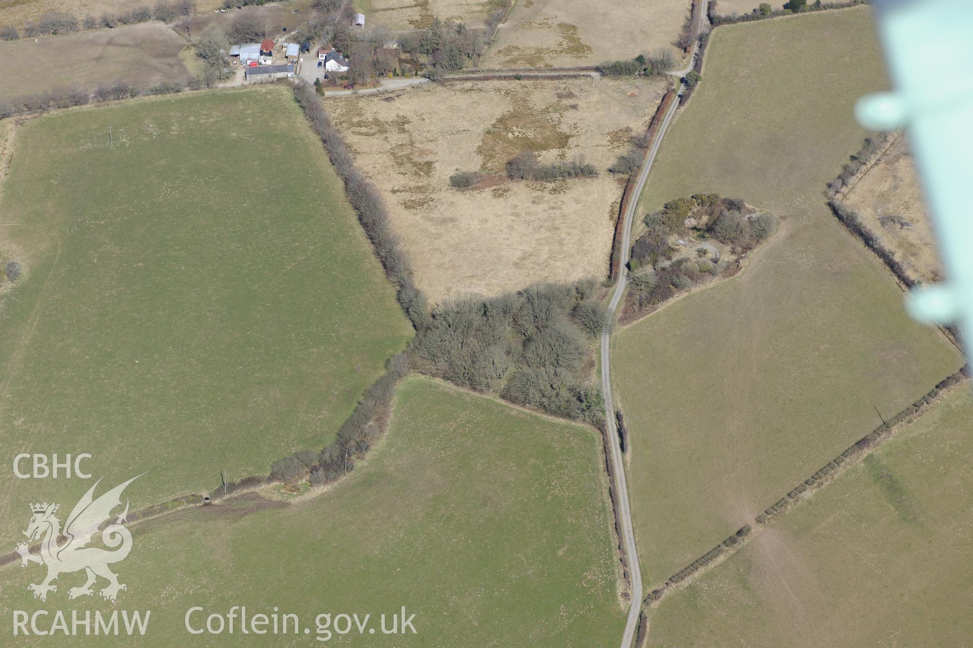 Gaer Fach defended enclosure, Cribyn, north west of Lampeter. Oblique aerial photograph taken during the Royal Commission's programme of archaeological aerial reconnaissance by Toby Driver on 2nd April 2013.