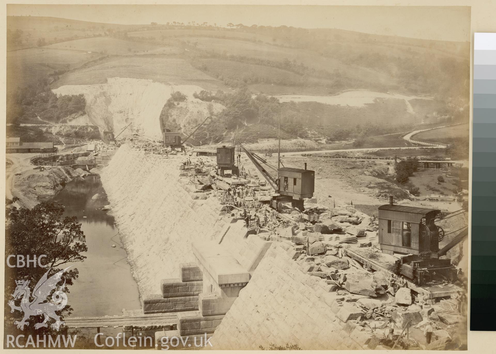 Digital copy of an albumen print from Edward Hubbard Collection. Album 'Lake Vyrnwy Photographs' print entitled 'The Vyrnwy Masonry Dam' showing the back of the wall looking southwest, taken June 1886.