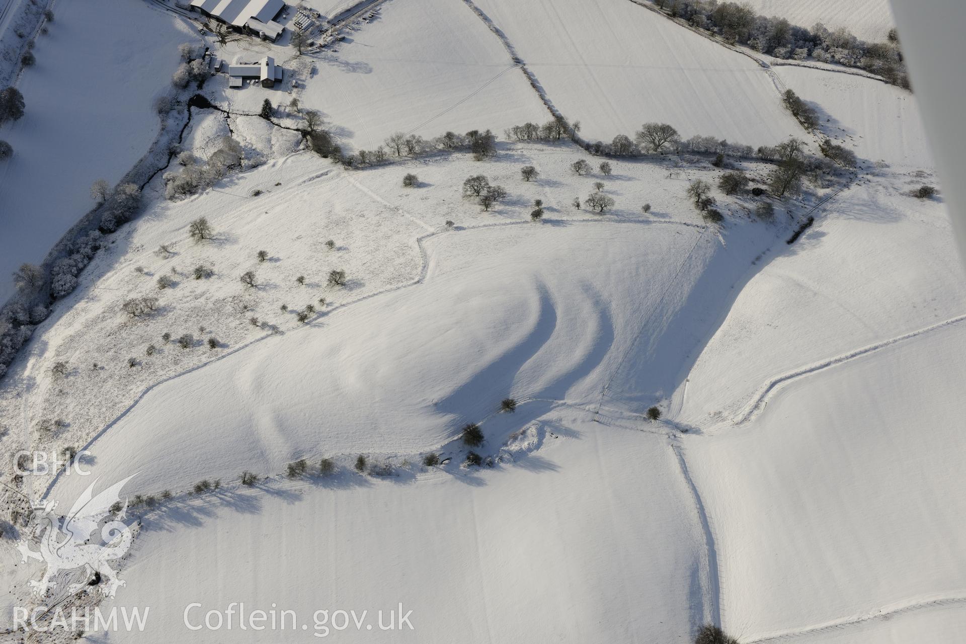 Wern Camp defended enclosure, Glascwm, north east of Builth Wells. Oblique aerial photograph taken during the Royal Commission?s programme of archaeological aerial reconnaissance by Toby Driver on 15th January 2013.