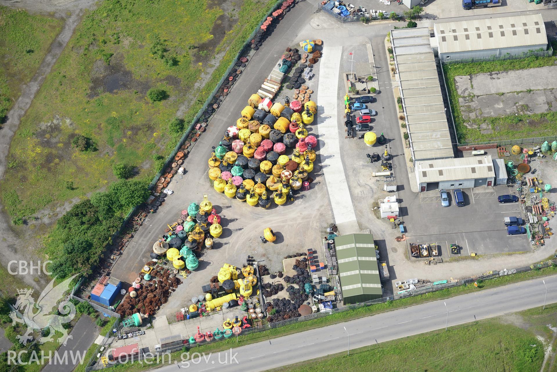 Swansea Docks. Oblique aerial photograph taken during the Royal Commission's programme of archaeological aerial reconnaissance by Toby Driver on 19th June 2015.