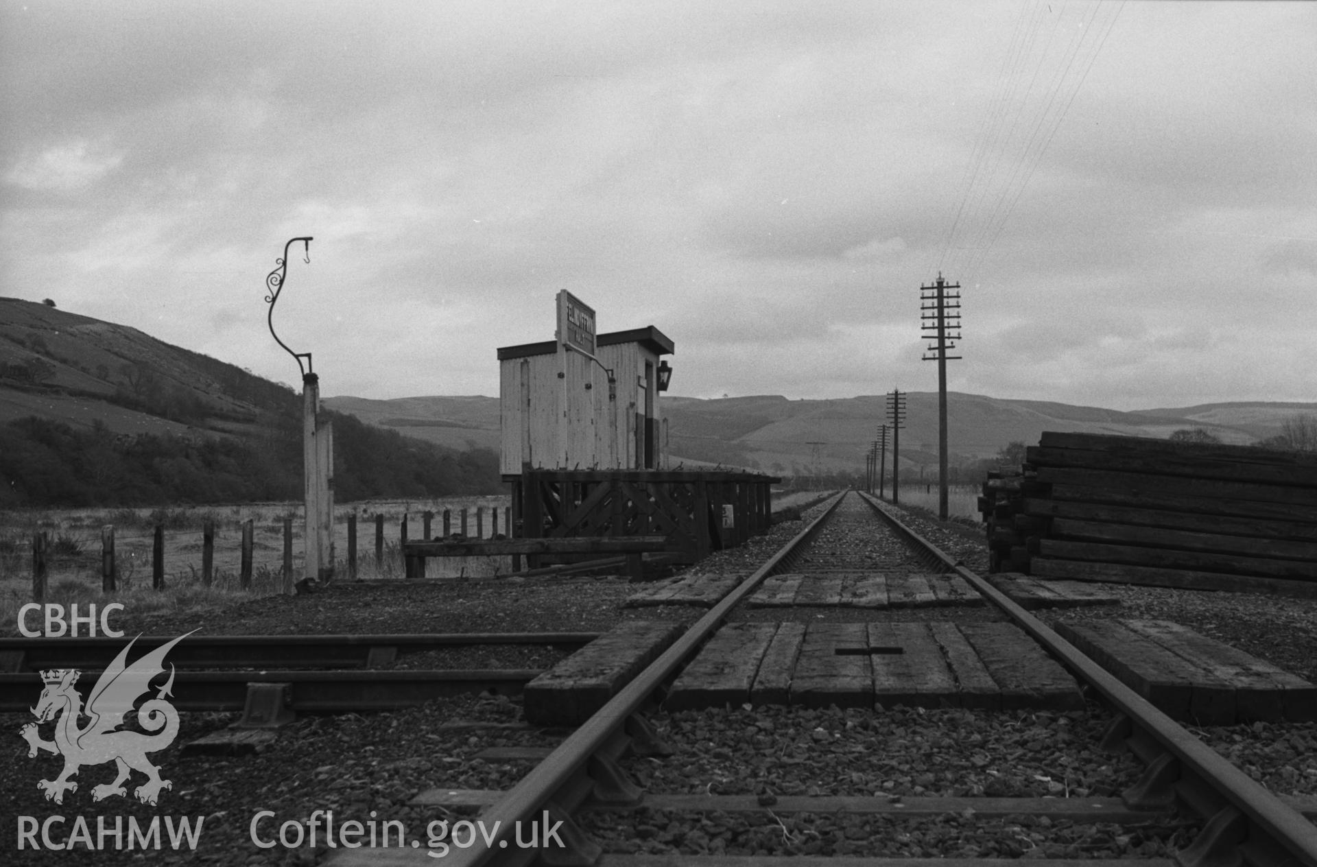 Digital copy of a black and white negative showing partly dismantled Felin Dyffryn railway halt, Llanilar. Photographed by Arthur O. Chater in April 1965 from Grid Reference SN 6513 7441, looking east south east.