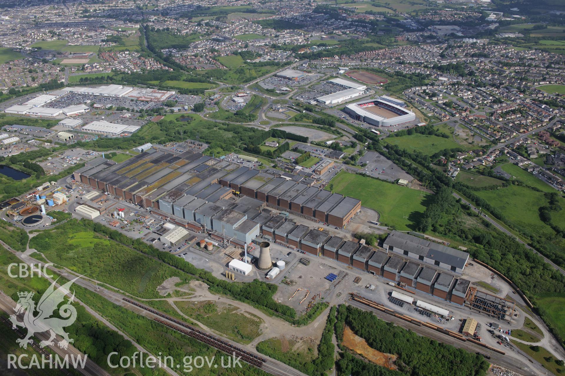 Trostre Steelworks, Maes-ar-Ddafen-Fach Farmhouse and Parc-y-Scarlets, Llanelli. Oblique aerial photograph taken during the Royal Commission's programme of archaeological aerial reconnaissance by Toby Driver on 19th June 2015.