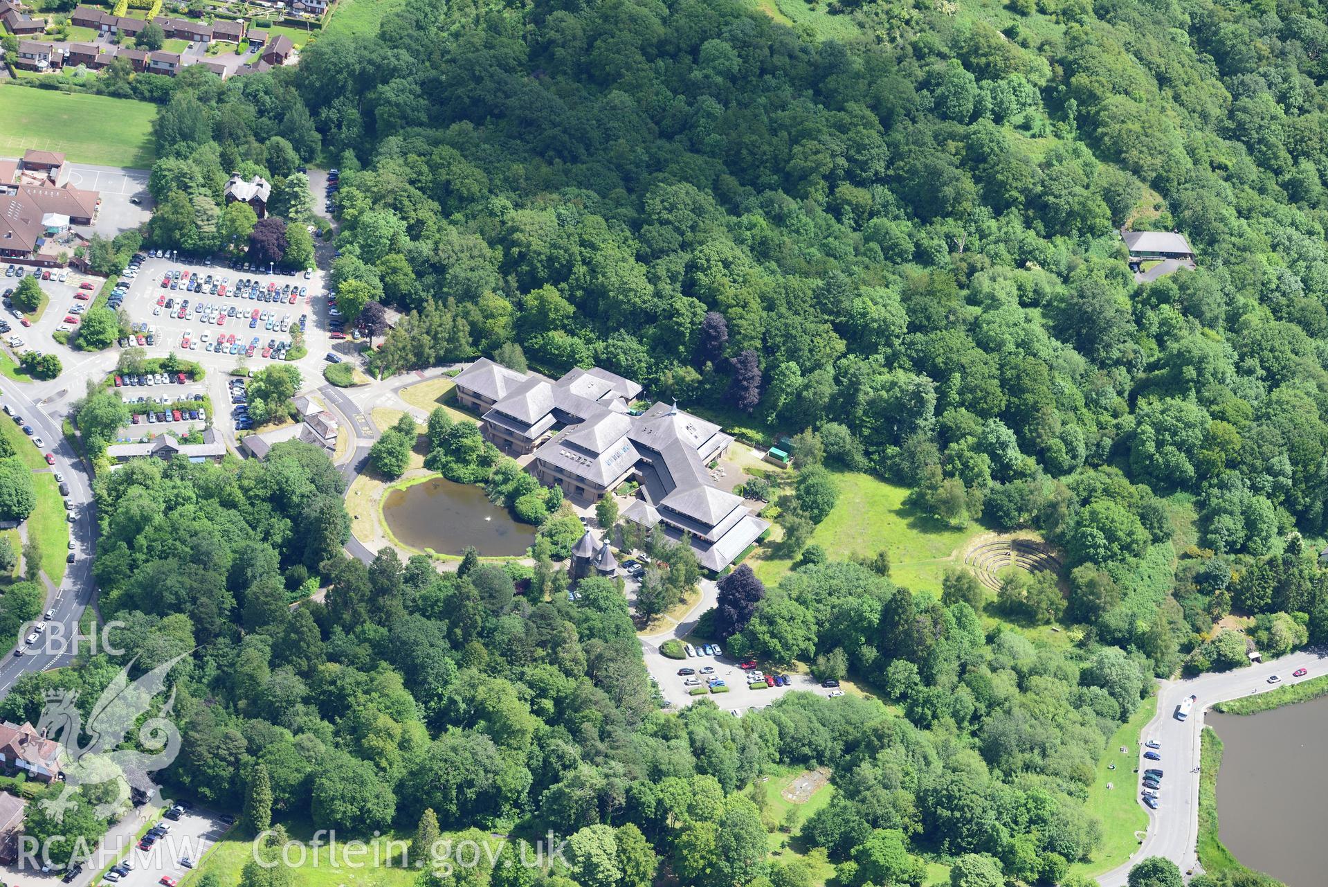 Powys County Hall, Lake Cottage and the site of Pump House and Pump House Hotel, Llandrindod Wells. Oblique aerial photograph taken during the Royal Commission's programme of archaeological aerial reconnaissance by Toby Driver on 30th June 2015.