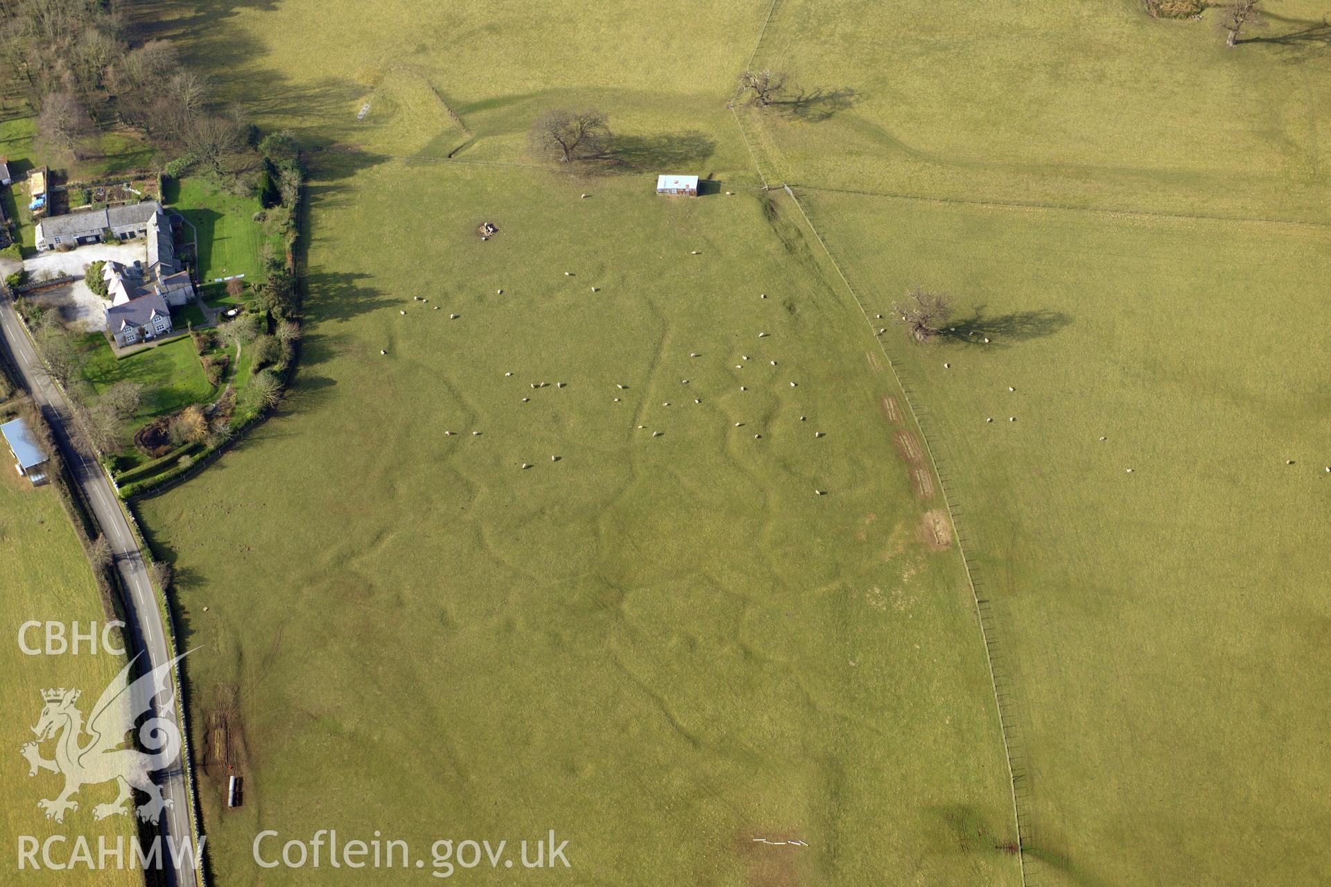 The south-eastern group of Bodelwyddan Park army practise trenches, at Bryn-Celyn, west of St. Asaph. Oblique aerial photograph taken during the Royal Commission?s programme of archaeological aerial reconnaissance by Toby Driver on 28th February 2013.