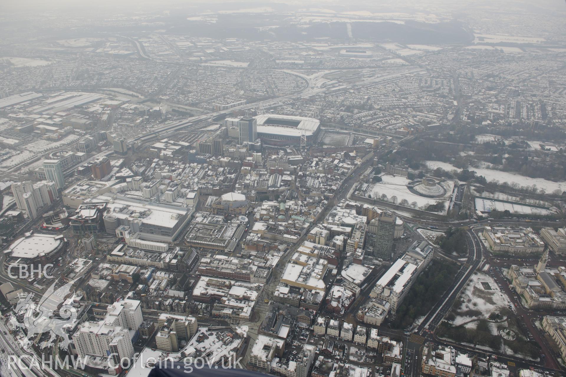 Cardiff Millennium Stadium, Cardiff International Arena, Cardiff Castle Grounds and Bute Park, Cardiff. Oblique aerial photograph taken during the Royal Commission?s programme of archaeological aerial reconnaissance by Toby Driver on 24th January 2013.