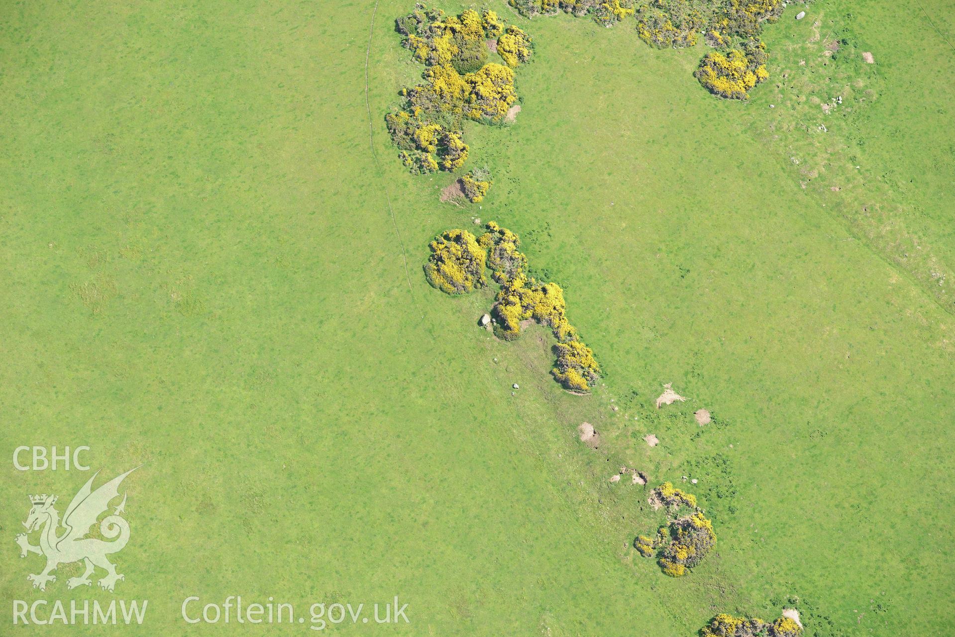 Lower Tregennis burial chamber. Oblique aerial photograph taken during the Royal Commission's programme of archaeological aerial reconnaissance by Toby Driver on 13th May 2015.