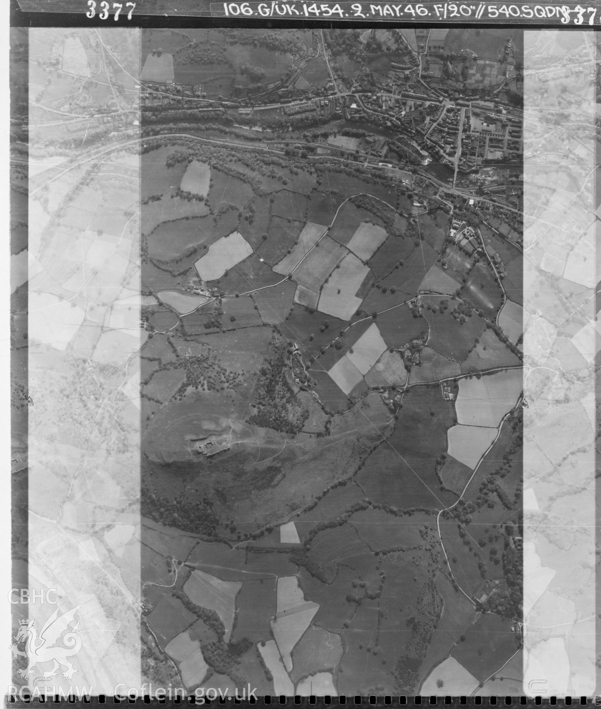 Digital copy of a black and white vertical aerial photograph taken by the RAF on 2/05/1946 centred on Dinas Bran.