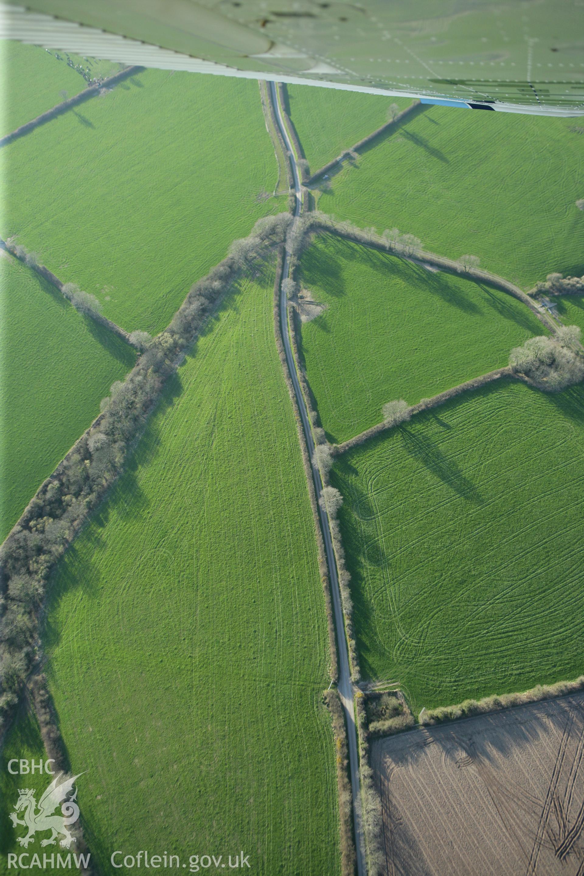 RCAHMW colour oblique aerial photograph of Walton Mill Rath. Taken on 13 April 2010 by Toby Driver