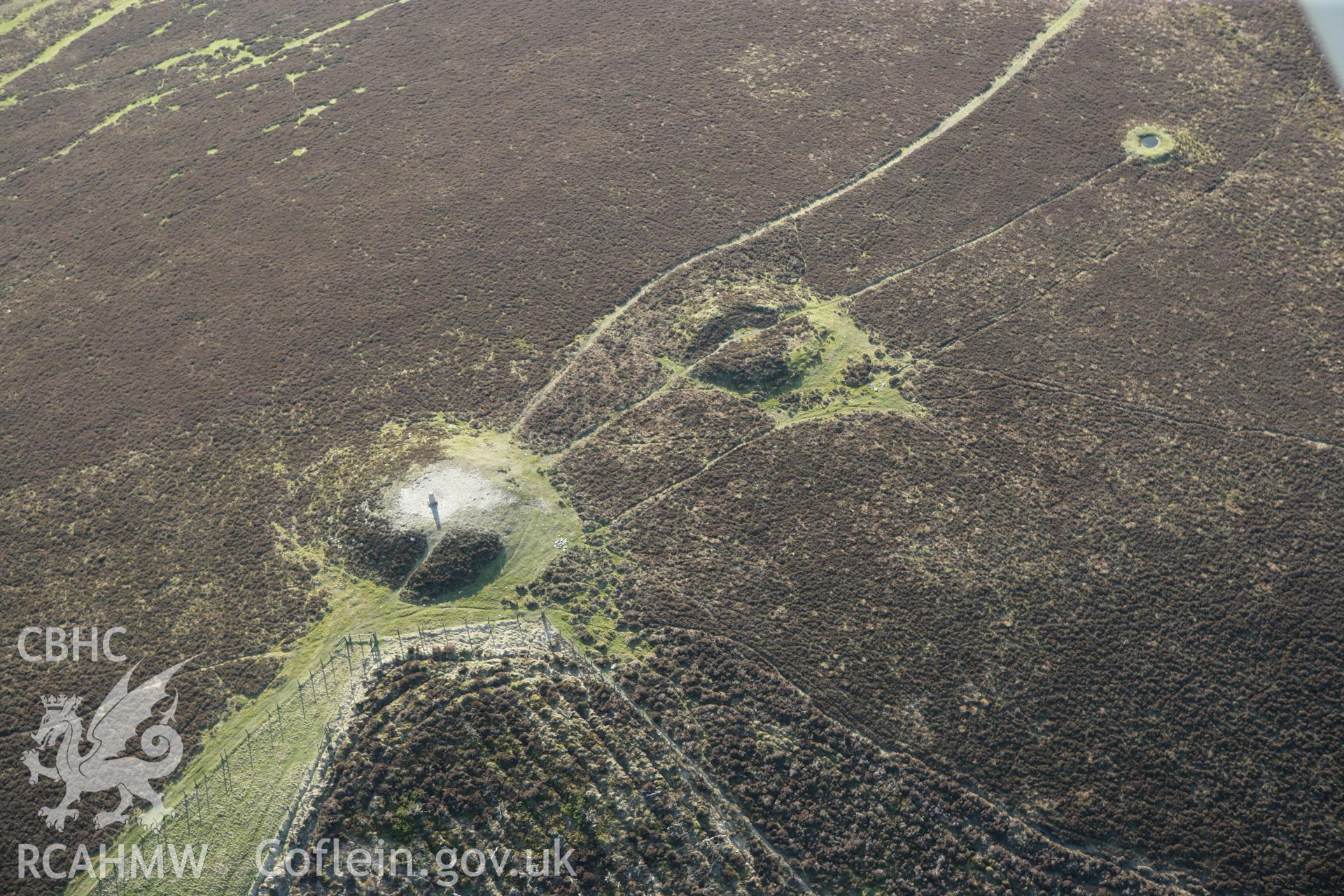 RCAHMW colour oblique aerial photograph of Y Frenni Fawr Cairns. Taken on 13 April 2010 by Toby Driver