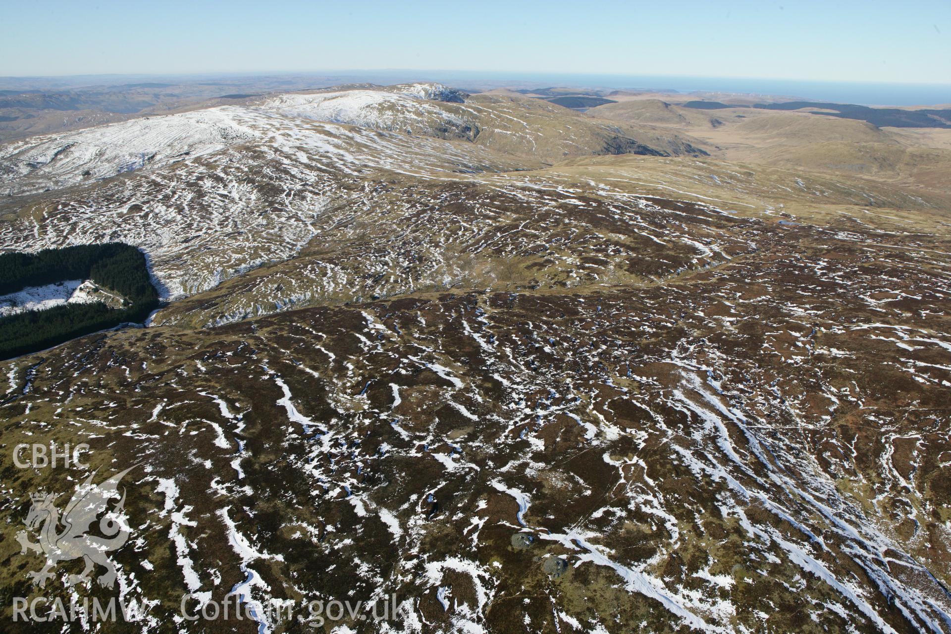 RCAHMW colour oblique photograph of Cairn Biga, Pumlumon Cwmbiga. Taken by Toby Driver on 08/03/2010.