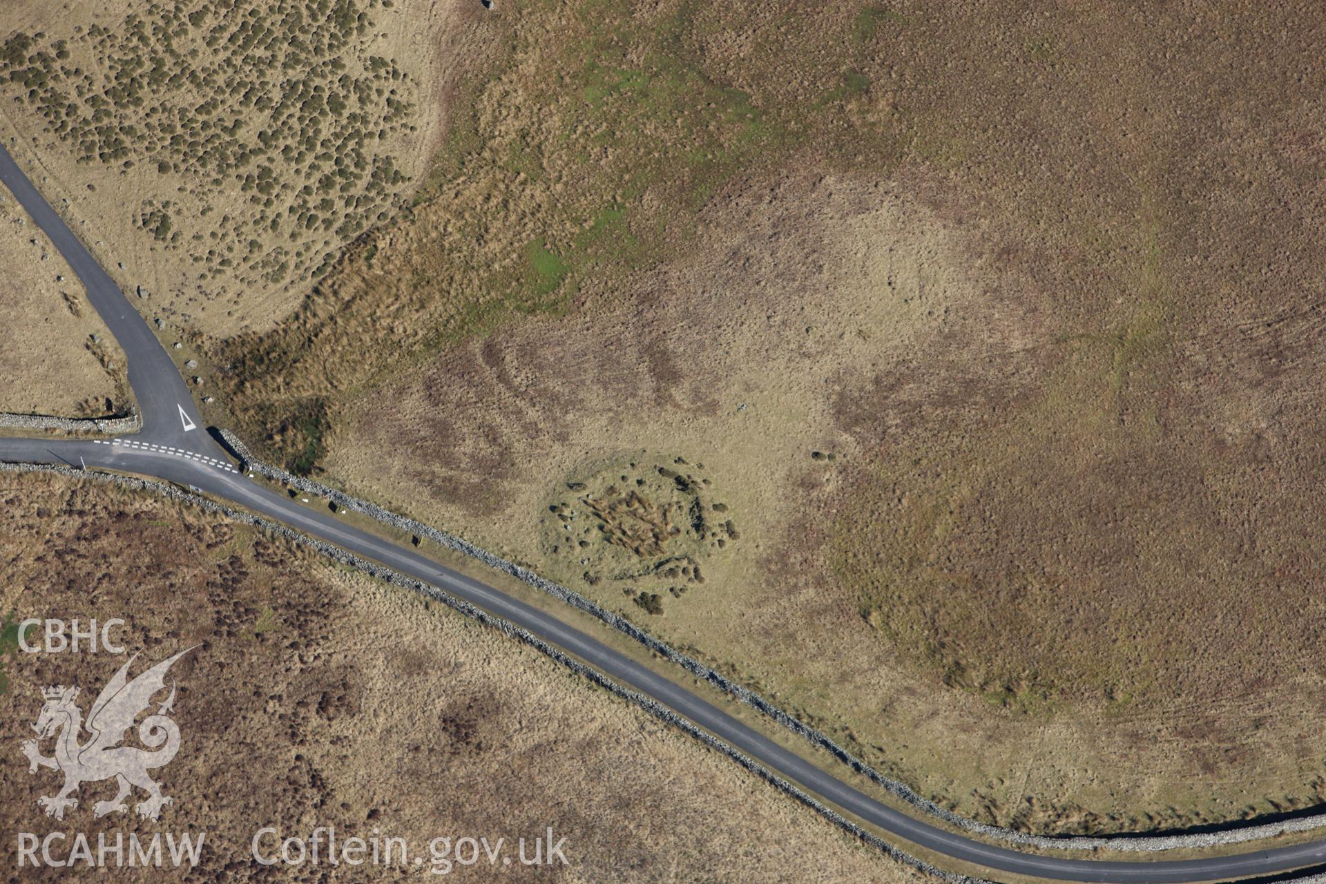 RCAHMW colour oblique photograph of The Cregennen Cairn , east of Hafotty fach. Taken by Toby Driver on 08/03/2010.