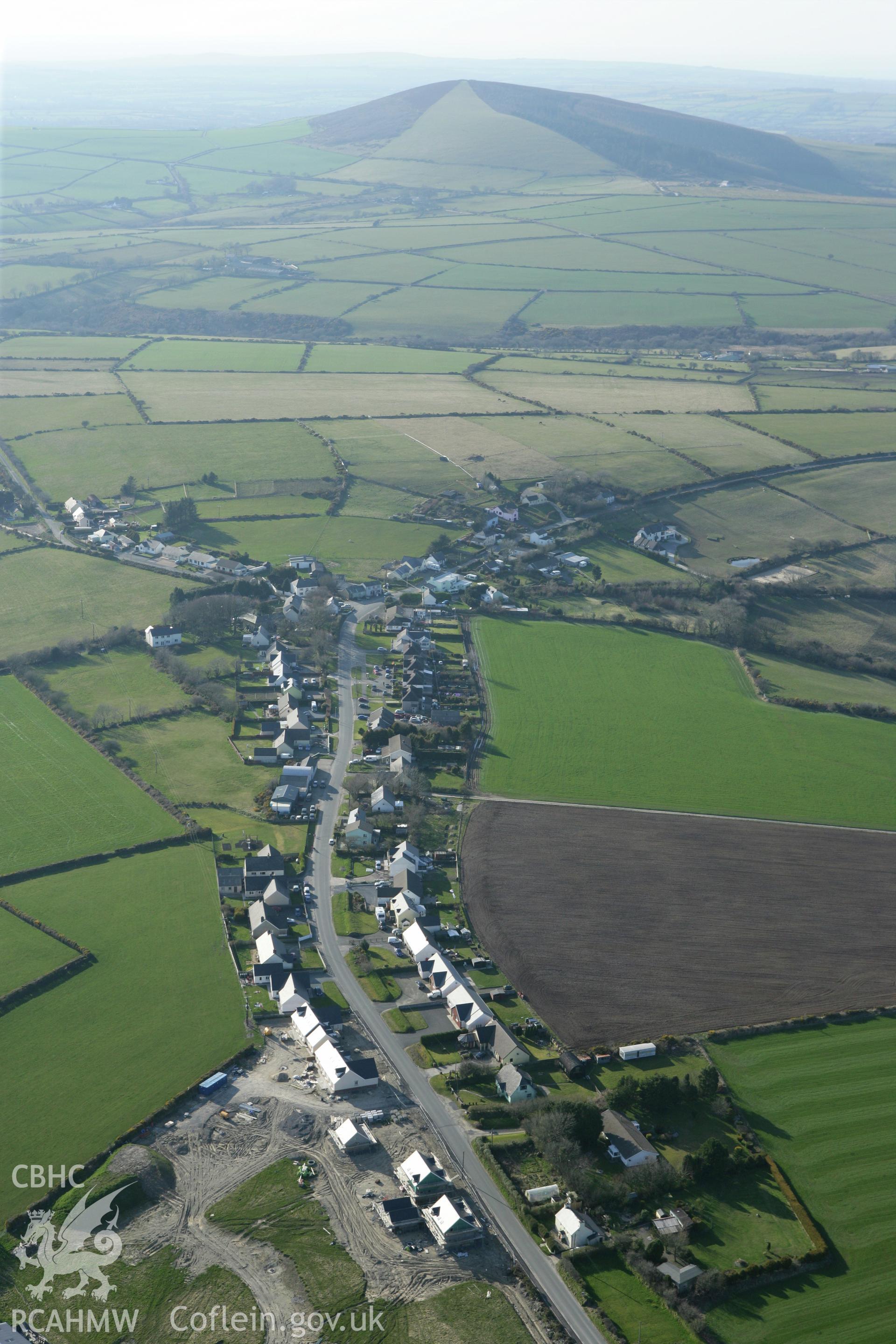 RCAHMW colour oblique aerial photograph of Tegryn Village and the landscape towards Frenni Fawr. Taken on 13 April 2010 by Toby Driver