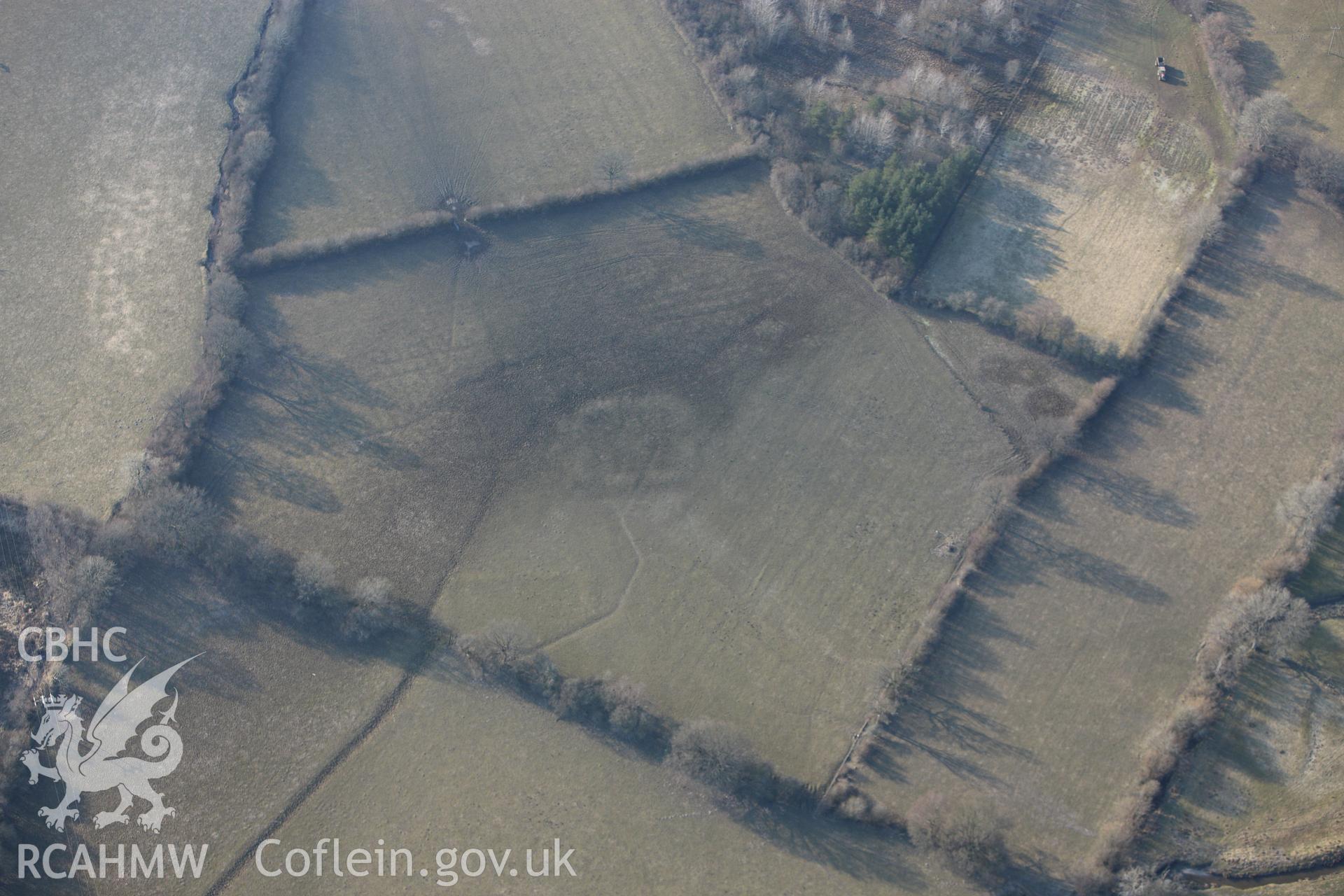 RCAHMW colour oblique photograph of Roman Camps to the south of The Gaer, Dolau. Taken by Toby Driver on 11/03/2010.