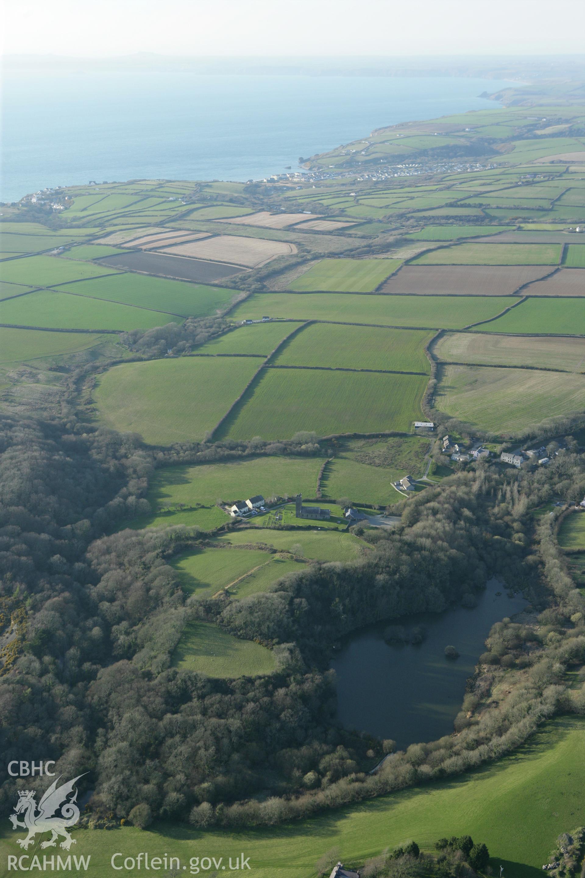 RCAHMW colour oblique aerial photograph of Syke Rath Promontory Fort and surrounding landscape. Taken on 13 April 2010 by Toby Driver