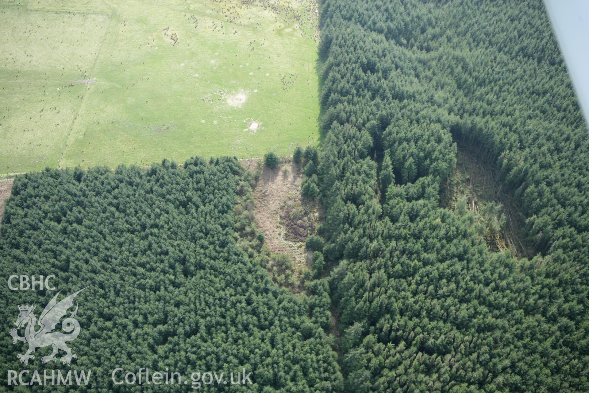 RCAHMW colour oblique aerial photograph of Crug-Bach. Taken on 13 April 2010 by Toby Driver