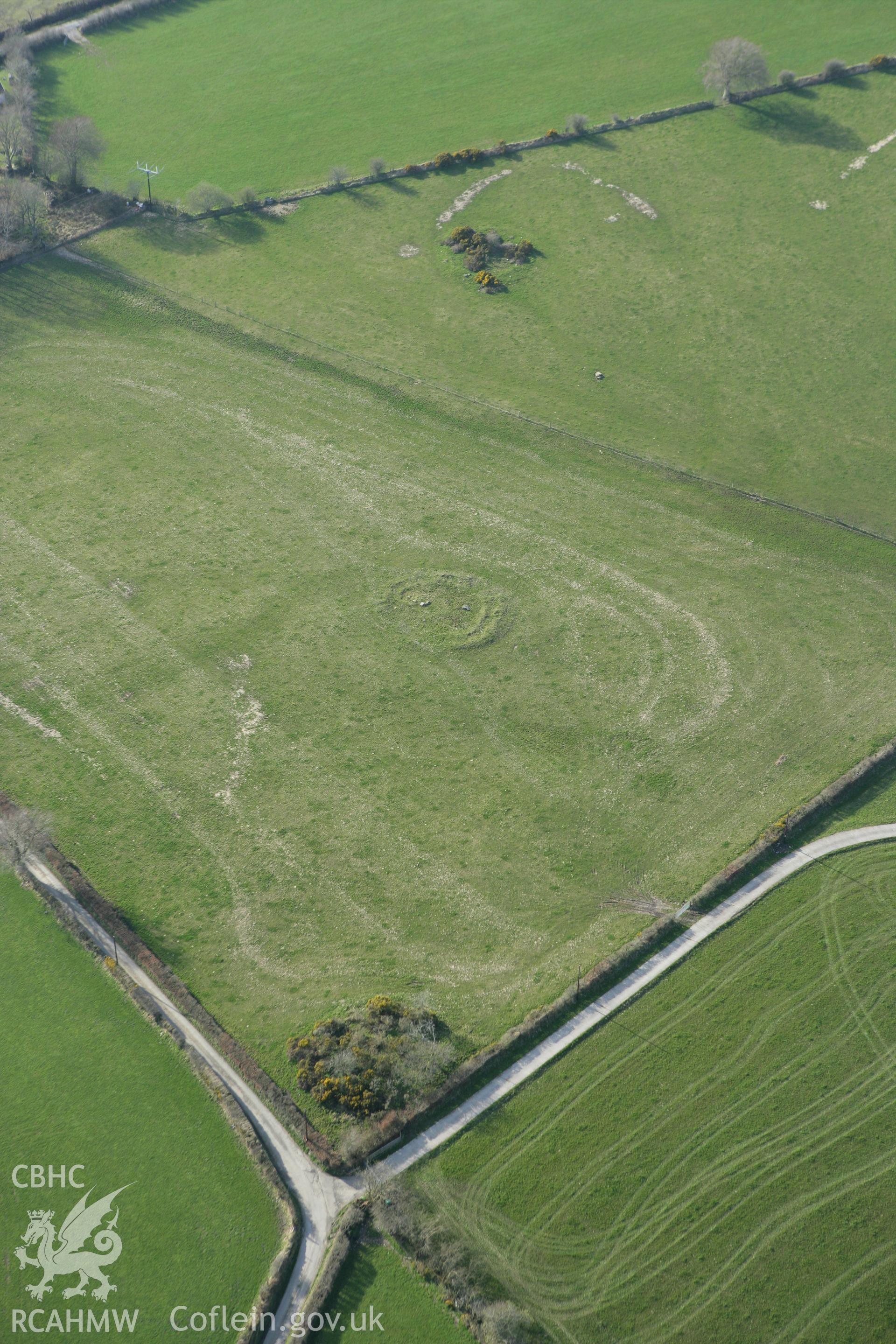 RCAHMW colour oblique aerial photograph of Blaennantrhys Cairn I. Taken on 13 April 2010 by Toby Driver