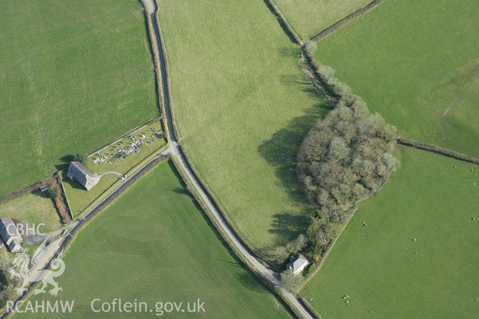 RCAHMW colour oblique aerial photograph of Pencastell motte. Taken on 13 April 2010 by Toby Driver