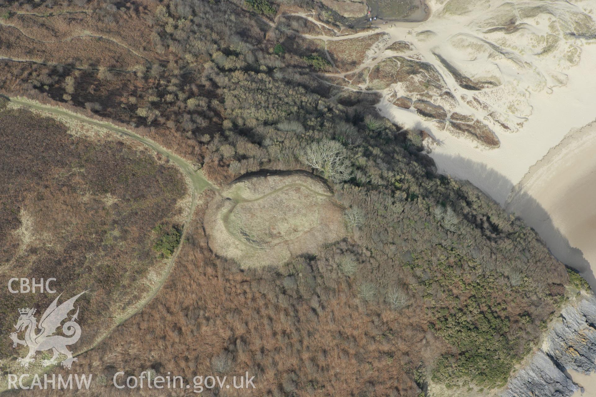 RCAHMW colour oblique photograph of Penmaen Burrows Ringwork. Taken by Toby Driver on 02/03/2010.