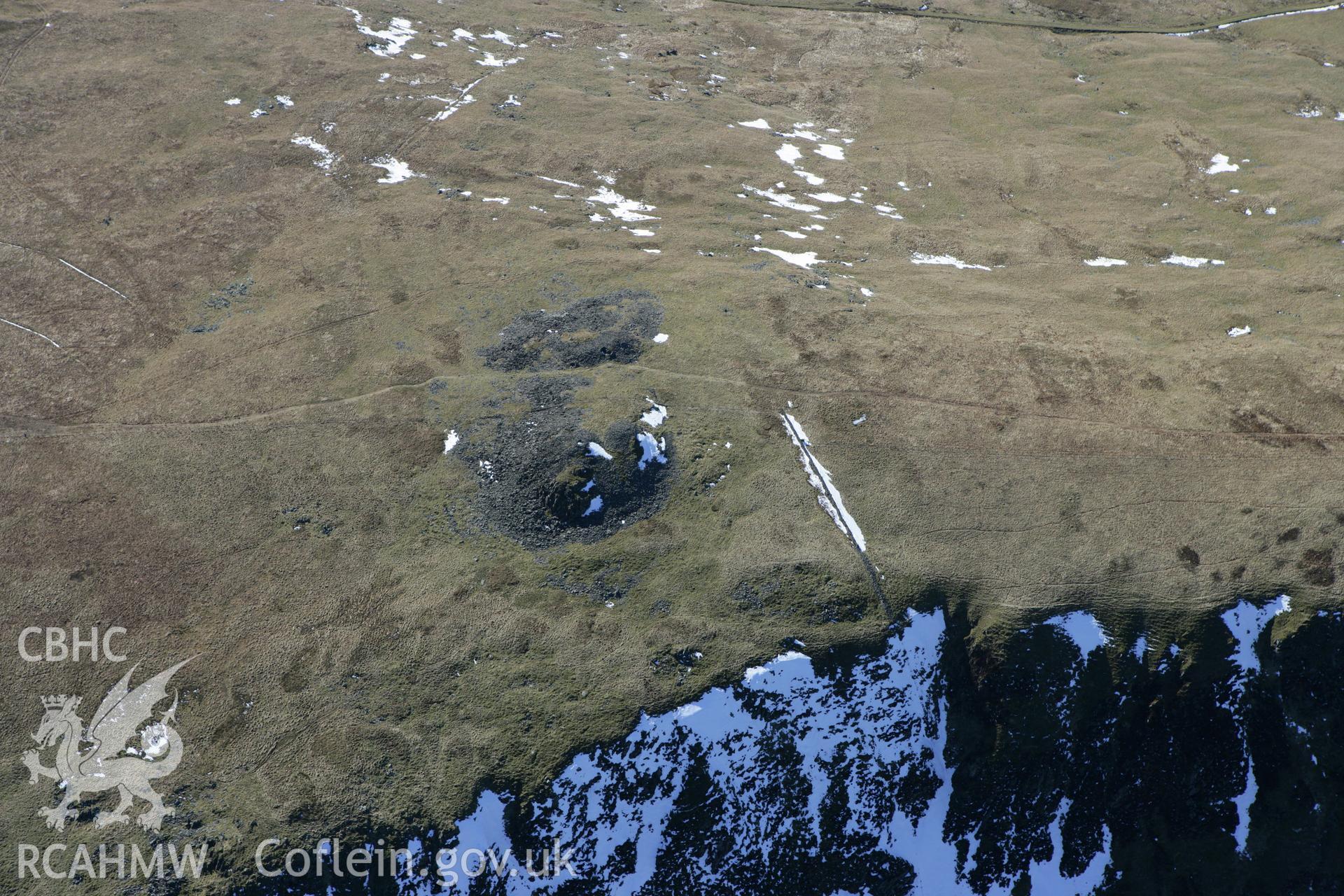 RCAHMW colour oblique photograph of Carnedd Lwyd cairns. Taken by Toby Driver on 08/03/2010.
