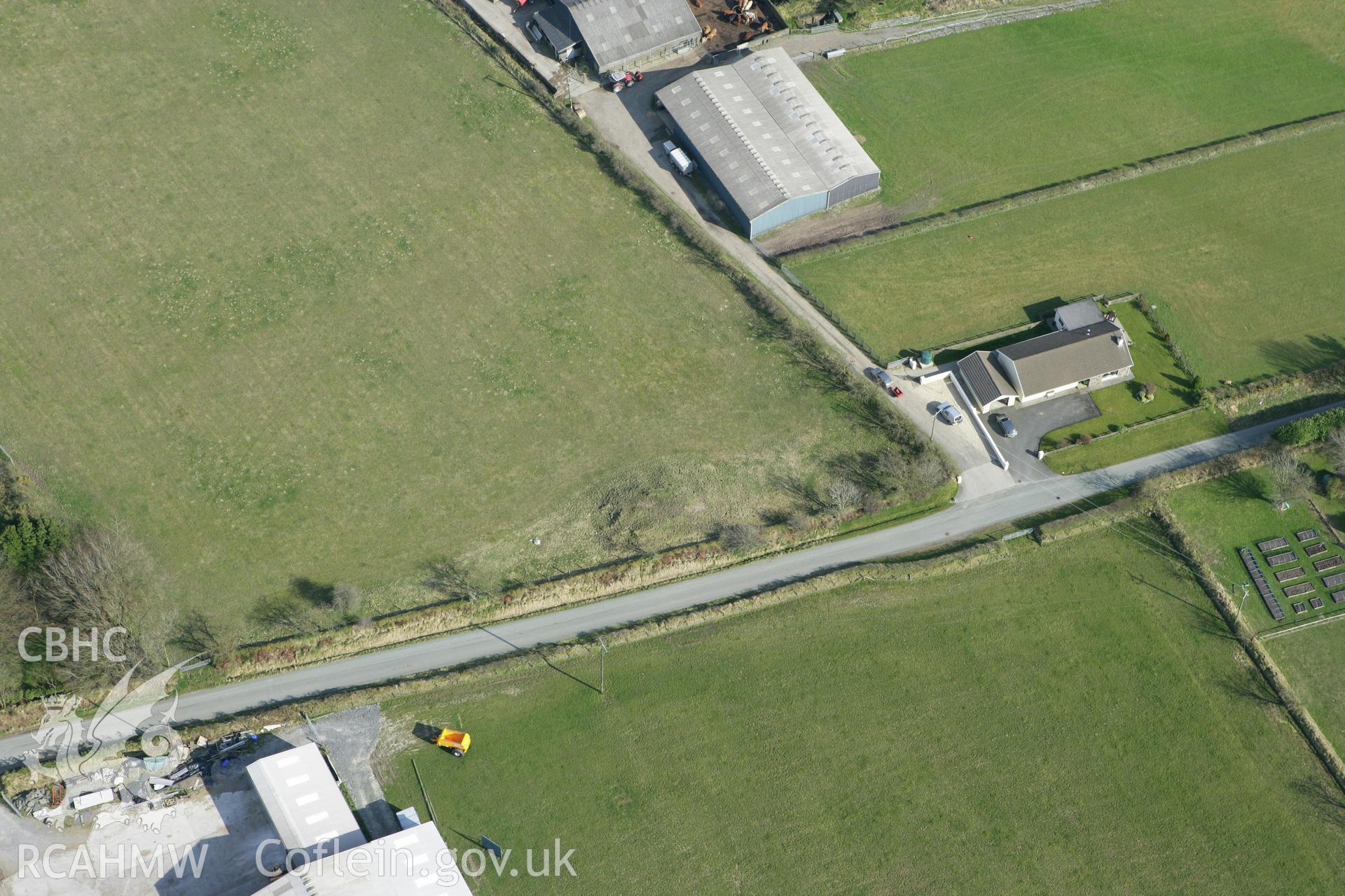 RCAHMW colour oblique aerial photograph of Crugygorllwyn. Taken on 13 April 2010 by Toby Driver