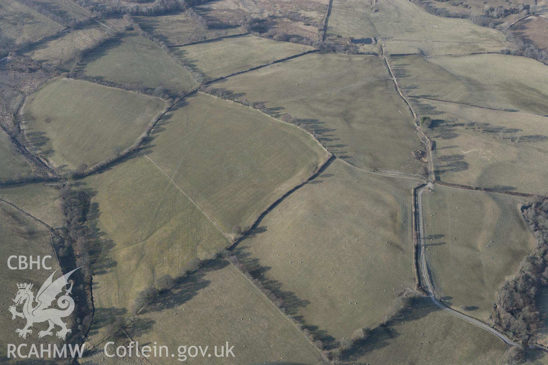 RCAHMW colour oblique photograph of Nantmel Marching Camp (Trefal Marching Camp). Taken by Toby Driver on 11/03/2010.