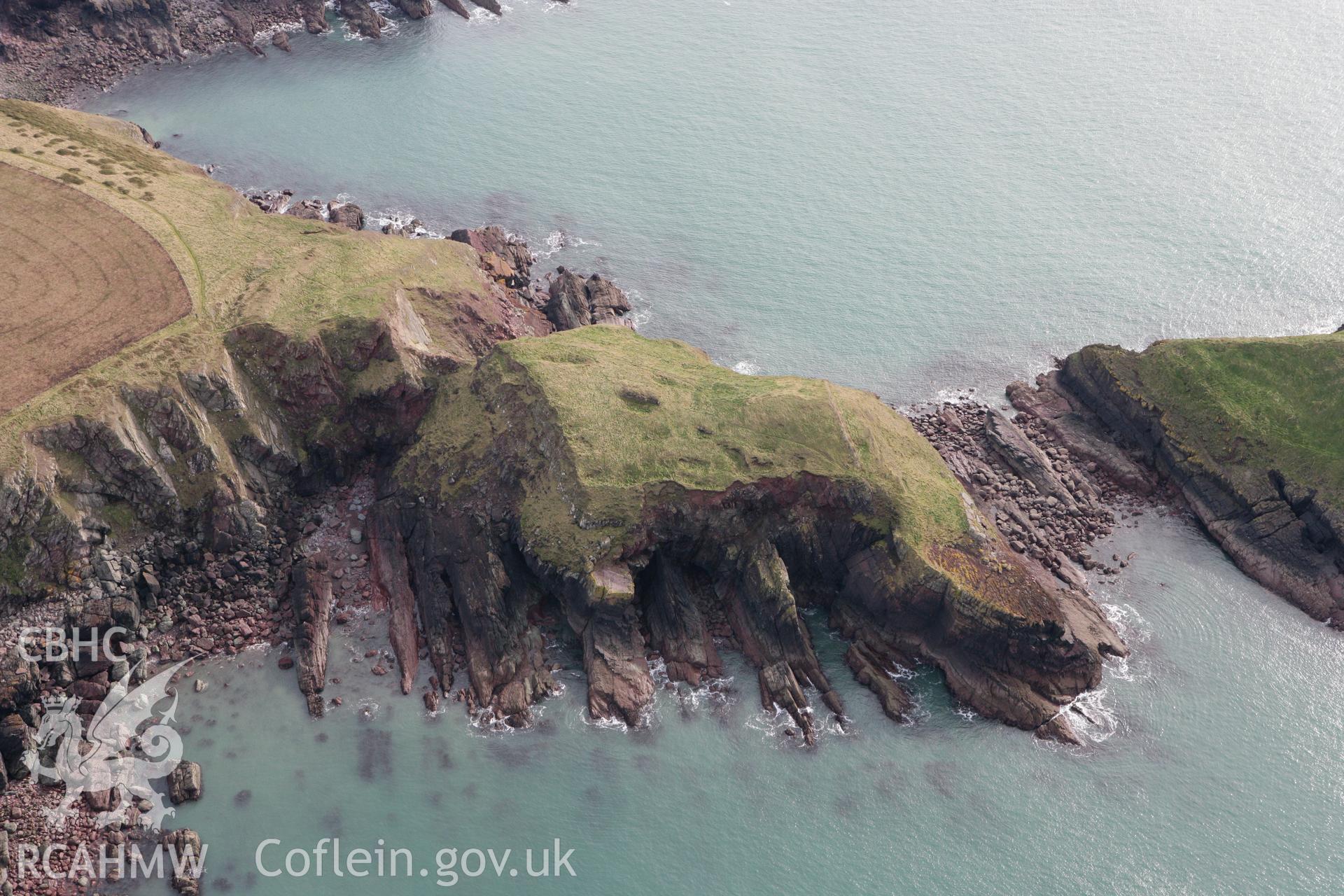 RCAHMW colour oblique aerial photograph of Sheep Island Promontory Fort. Taken on 02 March 2010 by Toby Driver