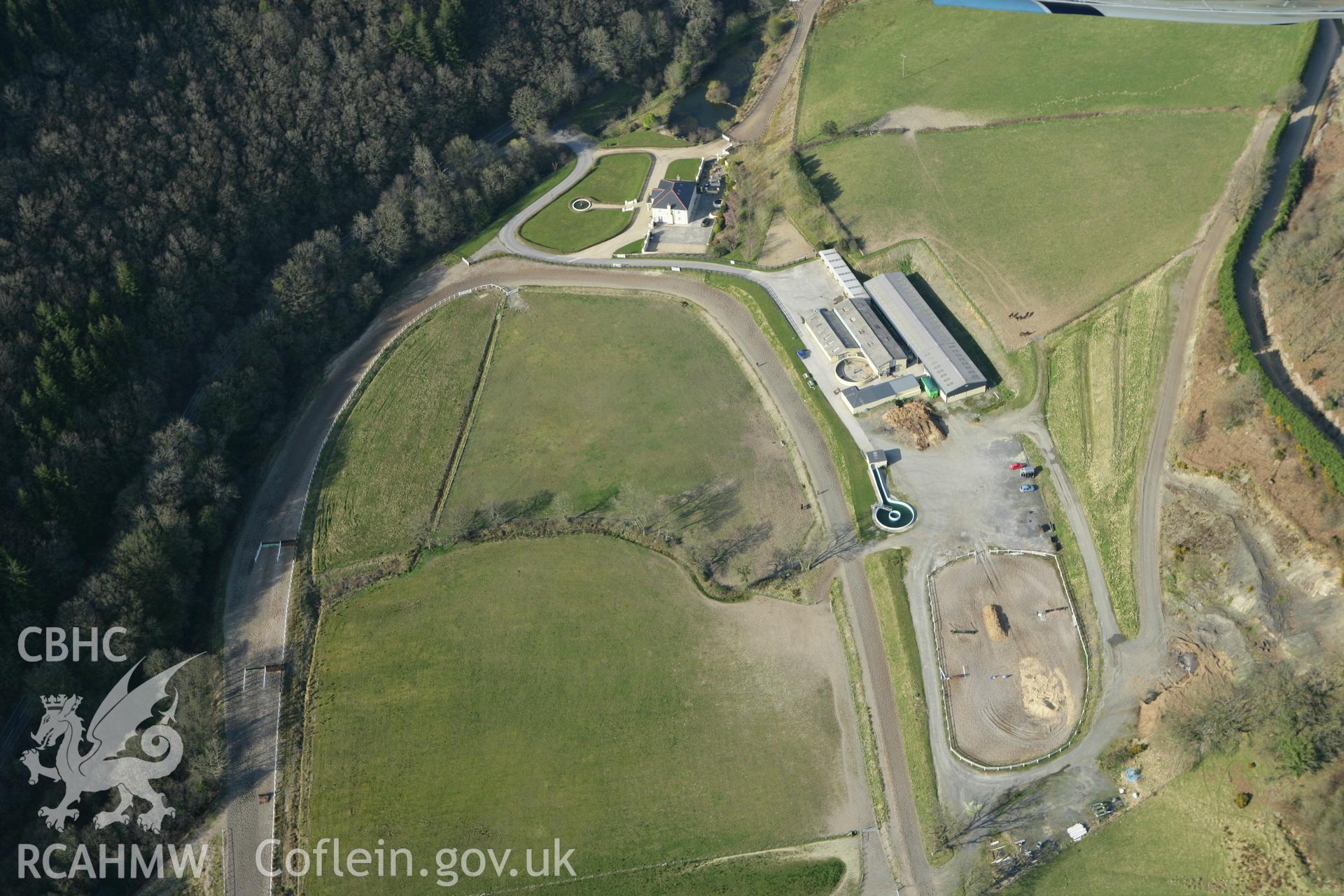 RCAHMW colour oblique aerial photograph of Crug, Allt Pant Glas. Taken on 13 April 2010 by Toby Driver