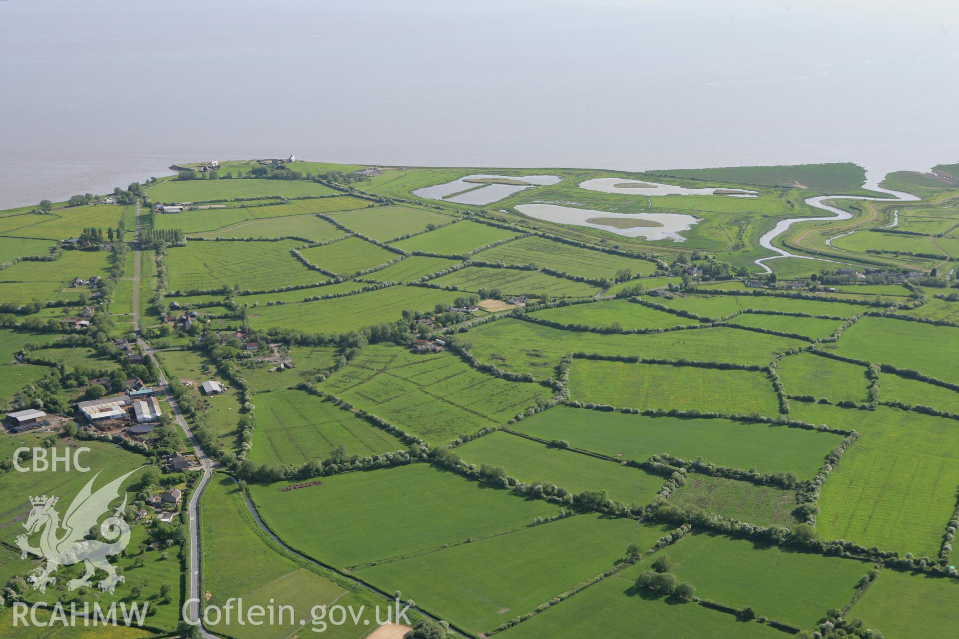 RCAHMW colour oblique photograph of Goldcliff Priory, looking over the Caldicot Levels from the north. Taken by Toby Driver on 24/05/2010.