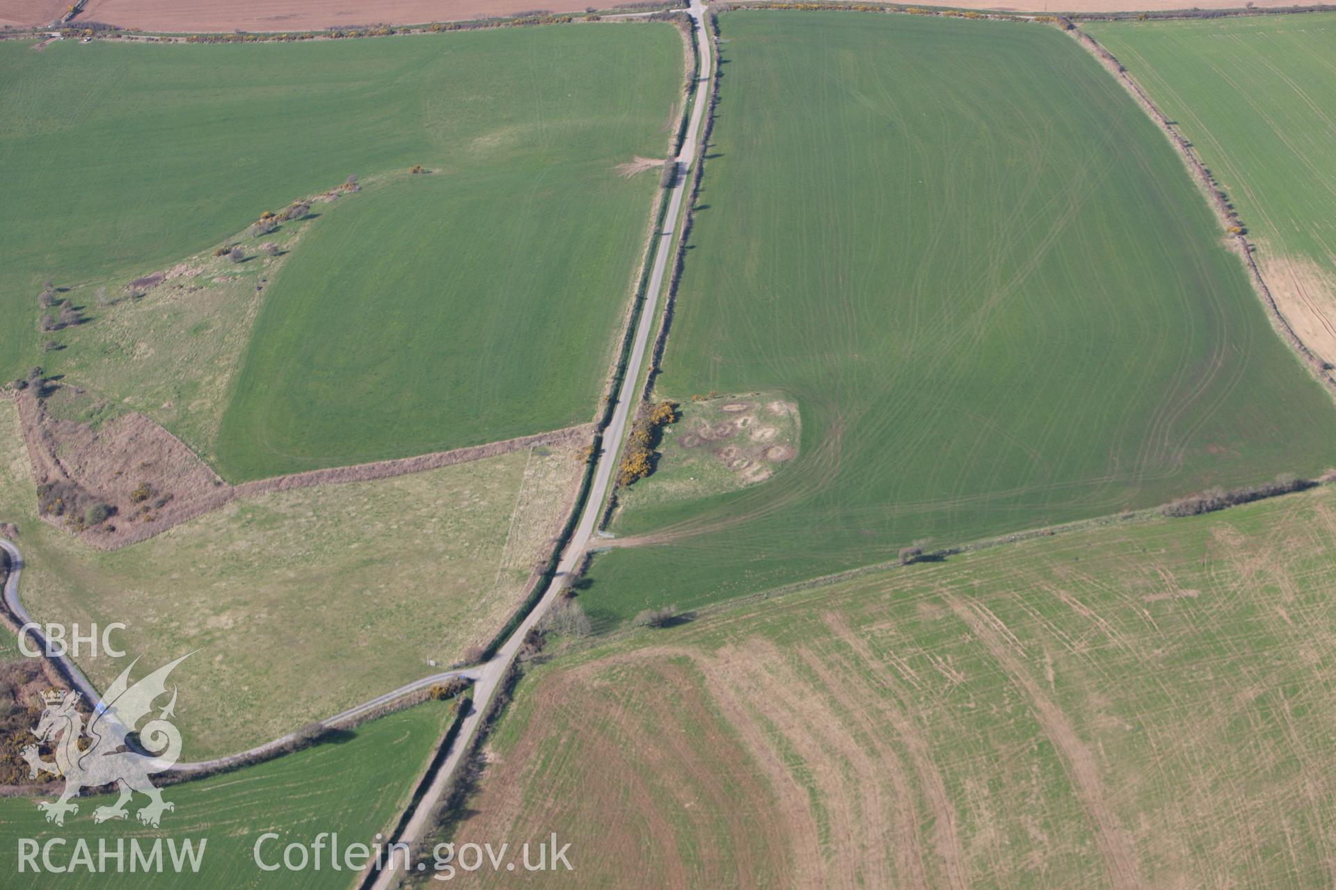 RCAHMW colour oblique aerial photograph of Y Gaer, Bayvil. Taken on 13 April 2010 by Toby Driver