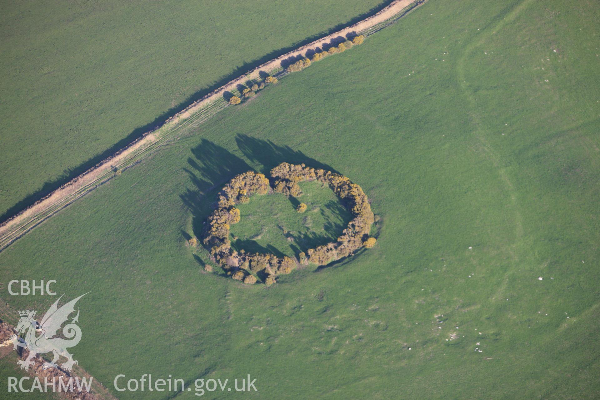 RCAHMW colour oblique aerial photograph of West Ford Rings. Taken on 13 April 2010 by Toby Driver