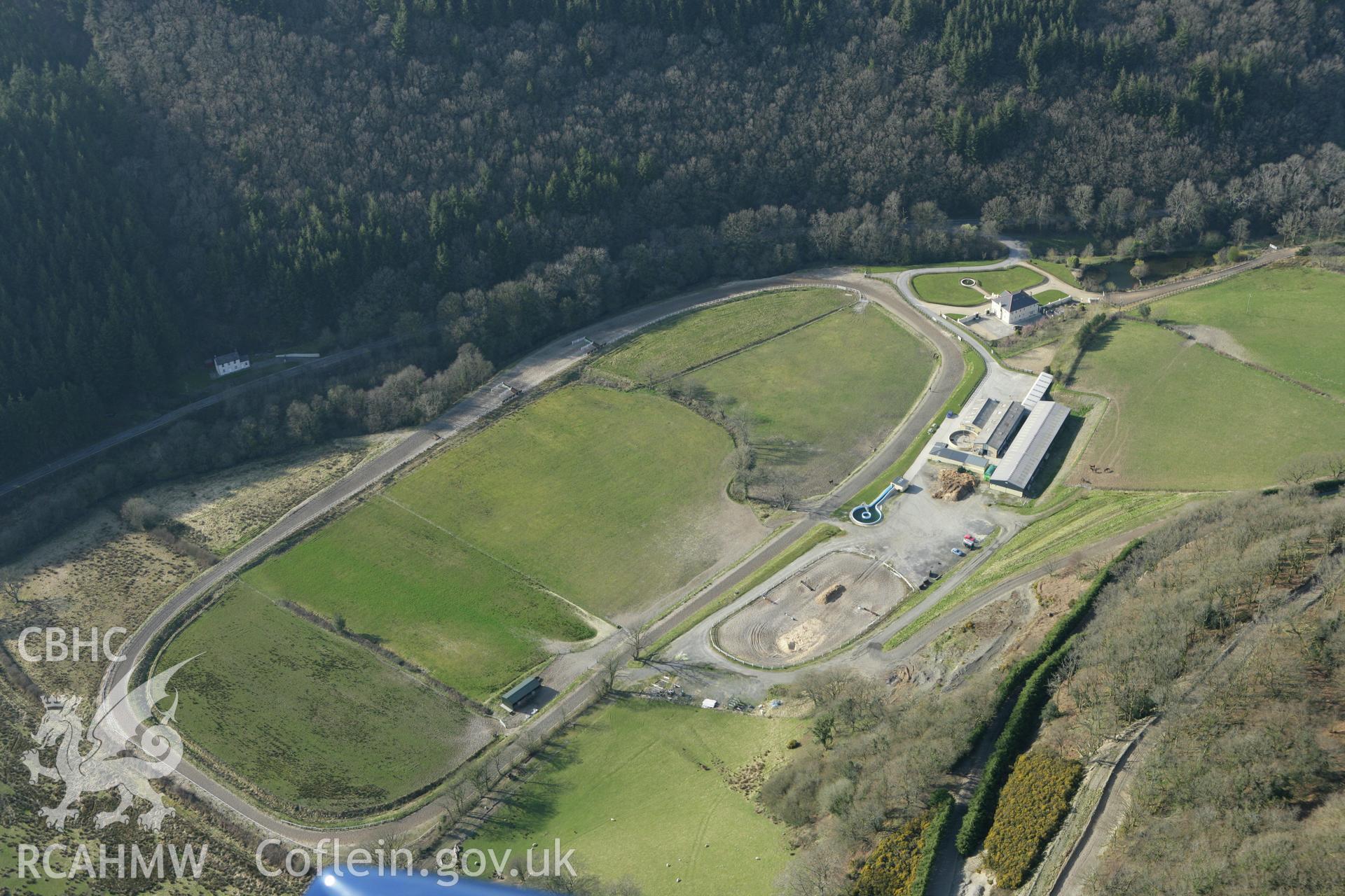 RCAHMW colour oblique aerial photograph of Crug, Allt Pant Glas. Taken on 13 April 2010 by Toby Driver