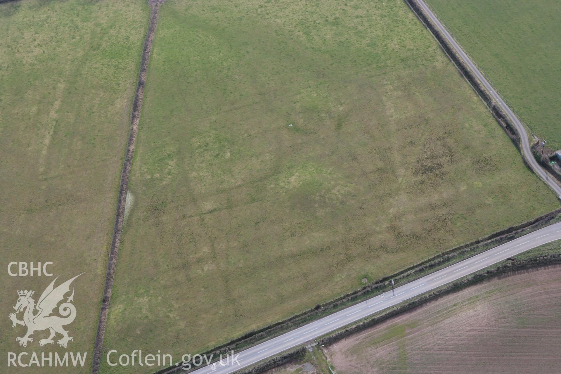 RCAHMW colour oblique aerial photograph of Dry Burrows Barrow Group near Hundleton. Taken on 02 March 2010 by Toby Driver