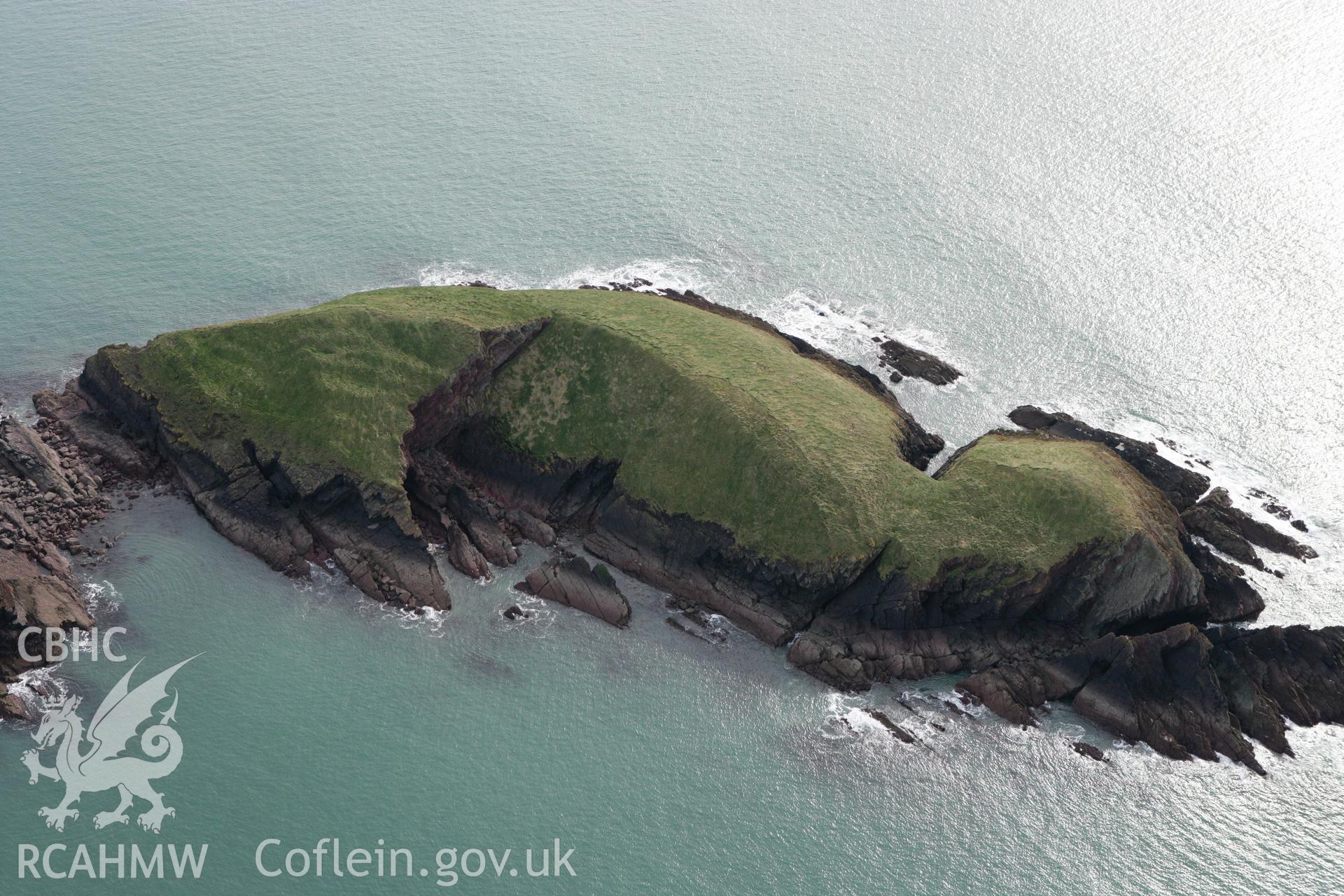 RCAHMW colour oblique aerial photograph of Sheep Island Promontory Fort. Taken on 02 March 2010 by Toby Driver