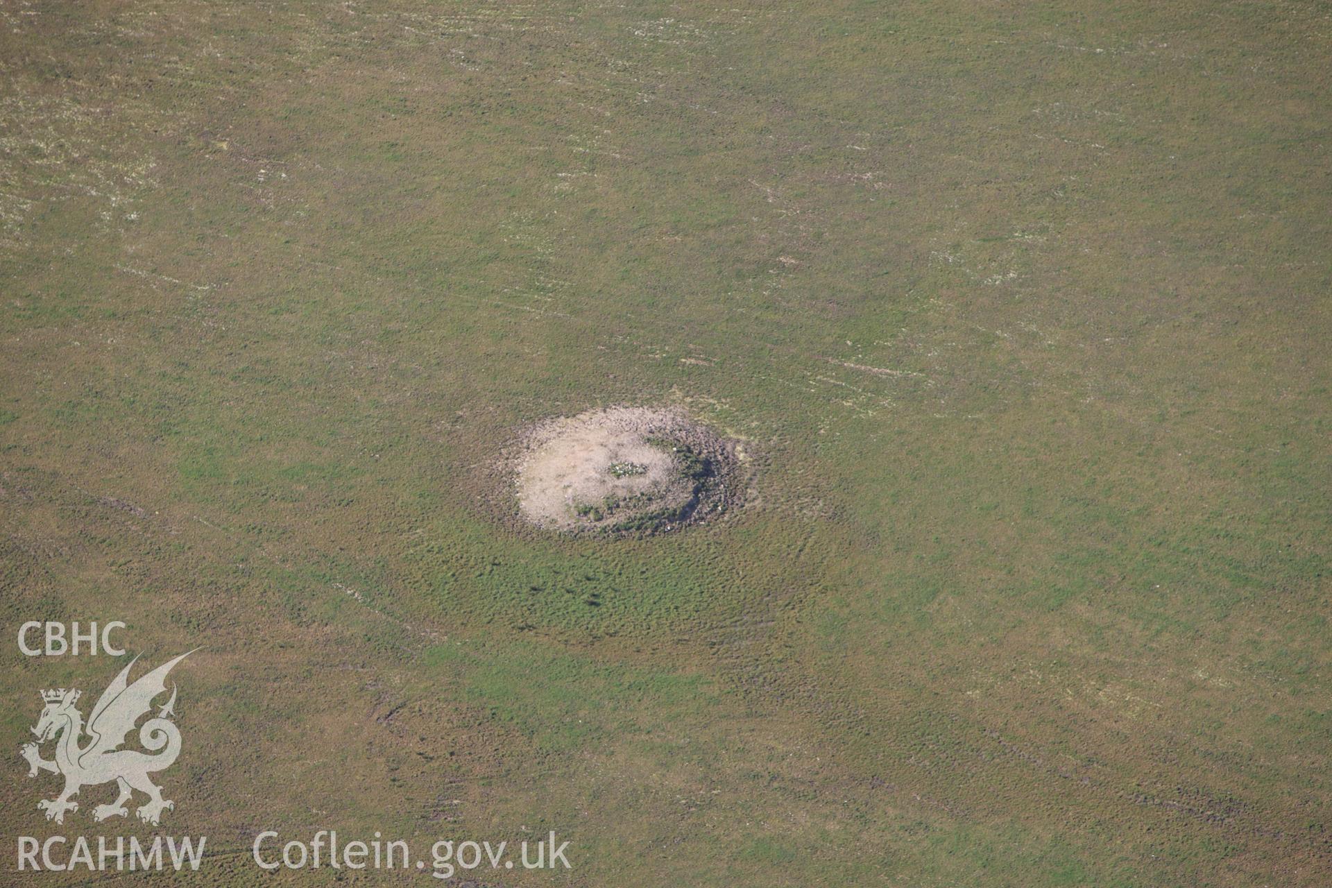 RCAHMW colour oblique aerial photograph of Crug Perfa. Taken on 13 April 2010 by Toby Driver