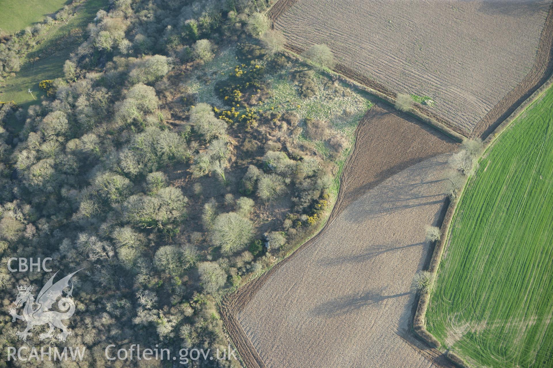 RCAHMW colour oblique aerial photograph of Sealyham Rocks Enclosure. Taken on 13 April 2010 by Toby Driver