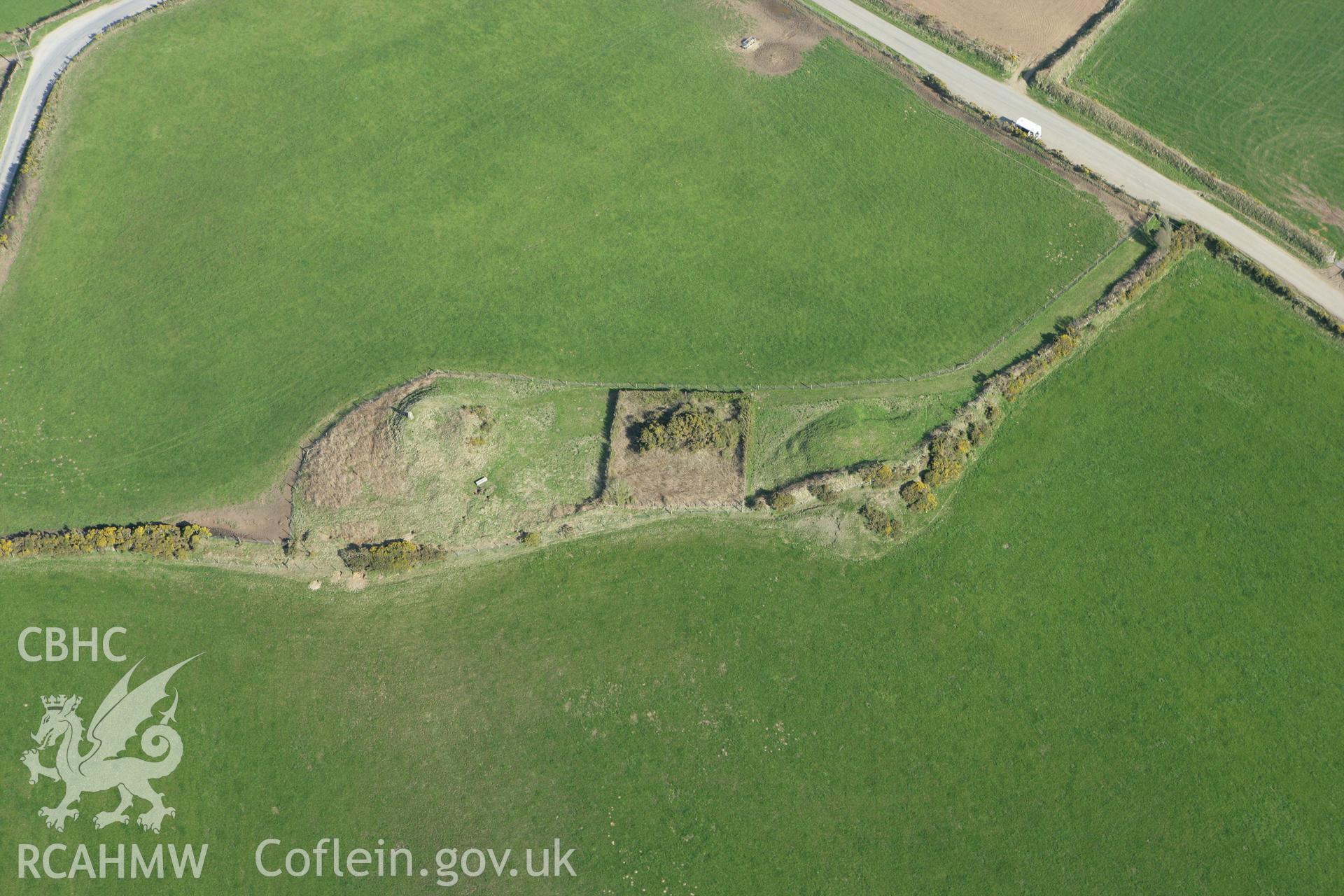 RCAHMW colour oblique aerial photograph of Crugiau Cemaes Barrow III. Taken on 13 April 2010 by Toby Driver