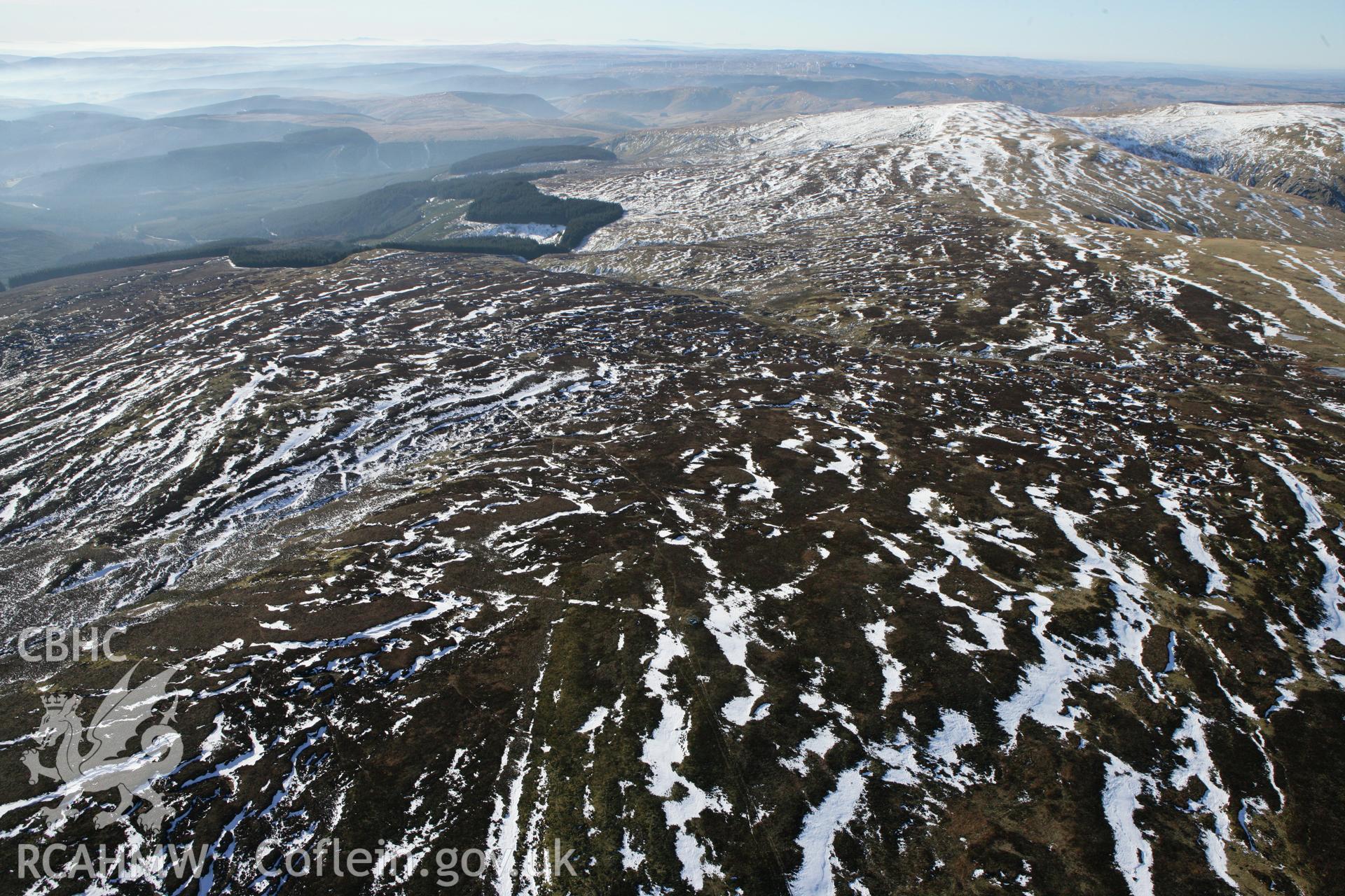 RCAHMW colour oblique photograph of Carn Fach Bugeilyn. Taken by Toby Driver on 08/03/2010.