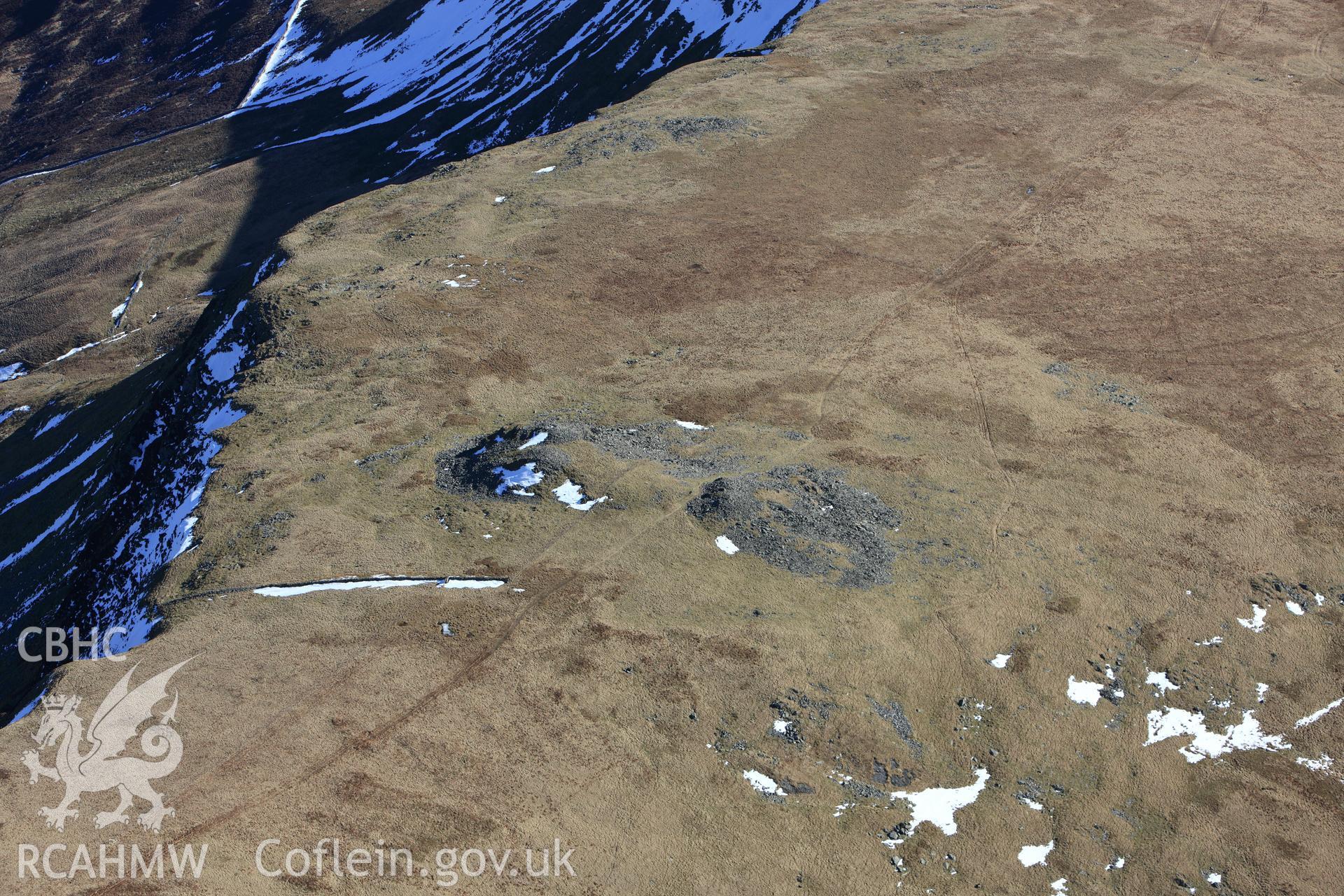 RCAHMW colour oblique photograph of Carnedd Lwyd cairns. Taken by Toby Driver on 08/03/2010.