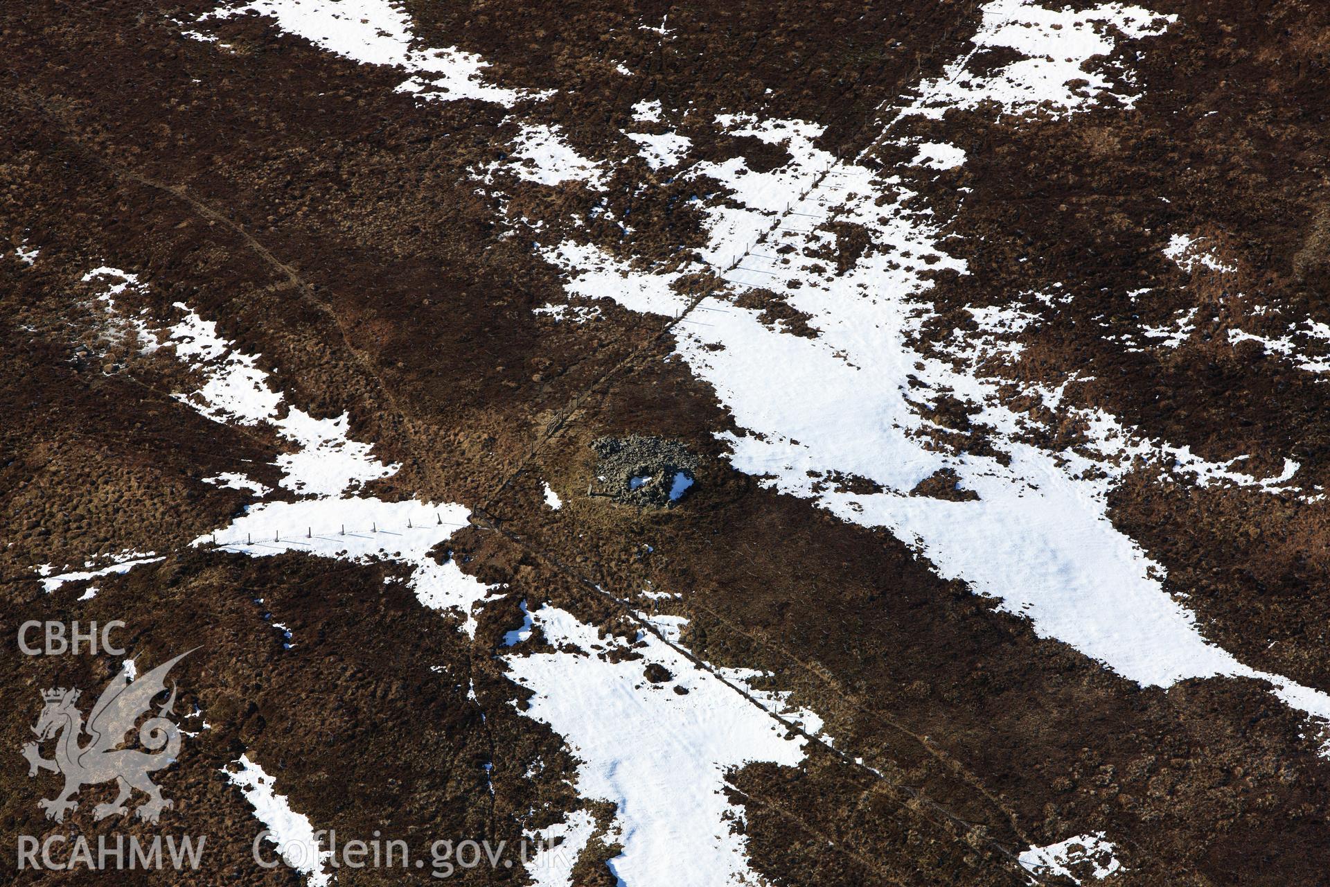 RCAHMW colour oblique photograph of Carn Fach Bugeilyn. Taken by Toby Driver on 08/03/2010.