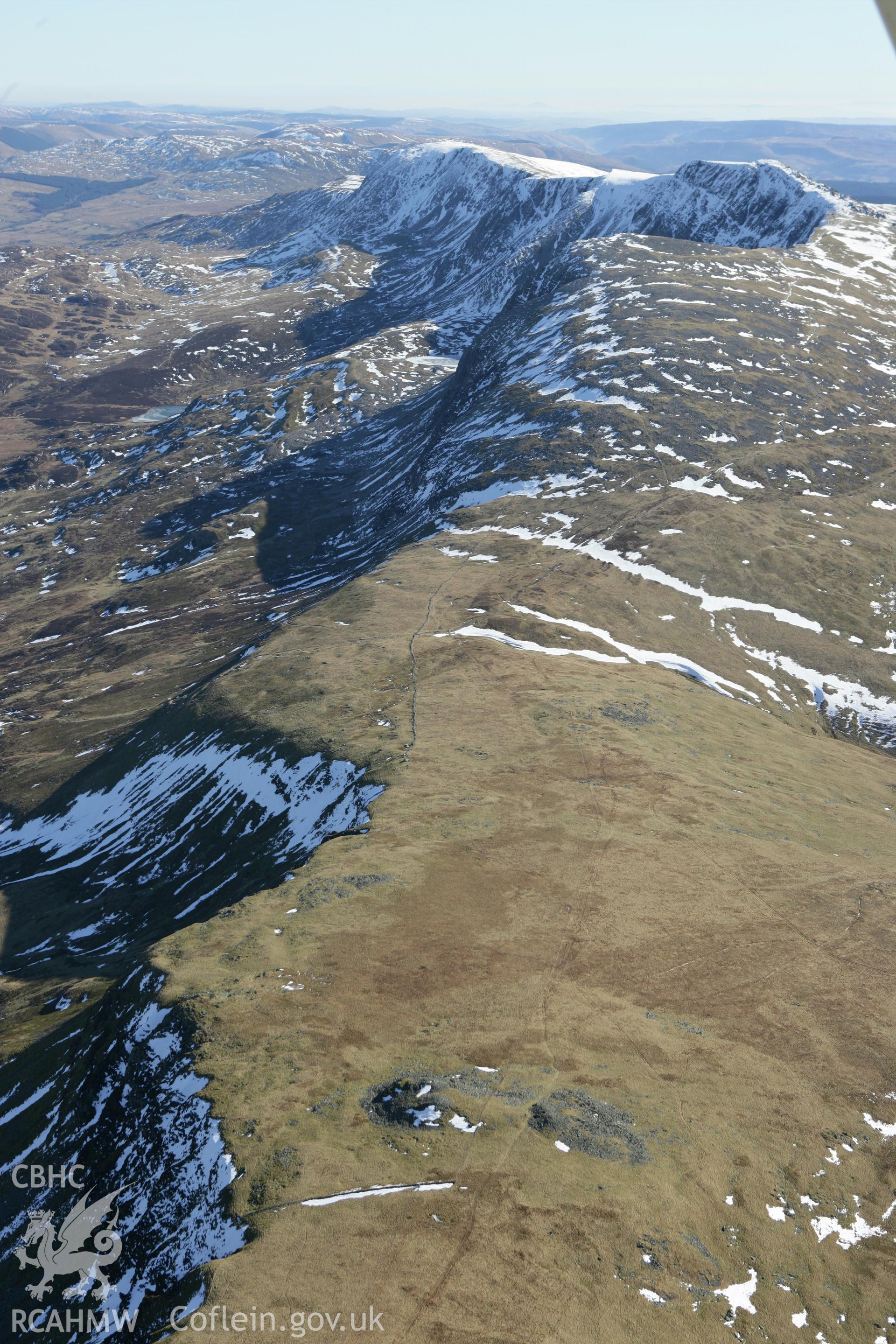 RCAHMW colour oblique photograph of Carnedd Lwyd cairns. Taken by Toby Driver on 08/03/2010.