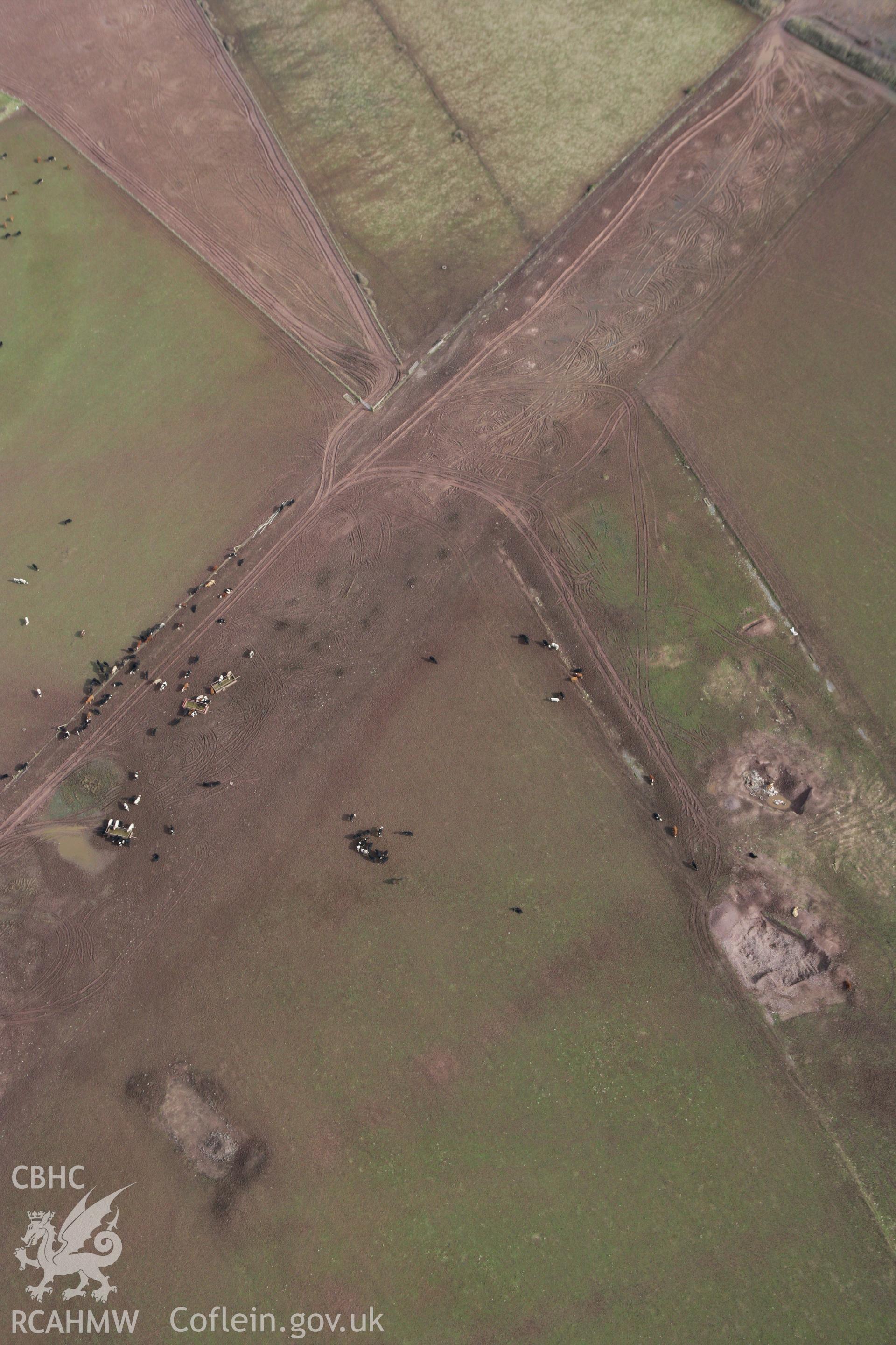 RCAHMW colour oblique aerial photograph of Angle Airfield. Taken on 02 March 2010 by Toby Driver