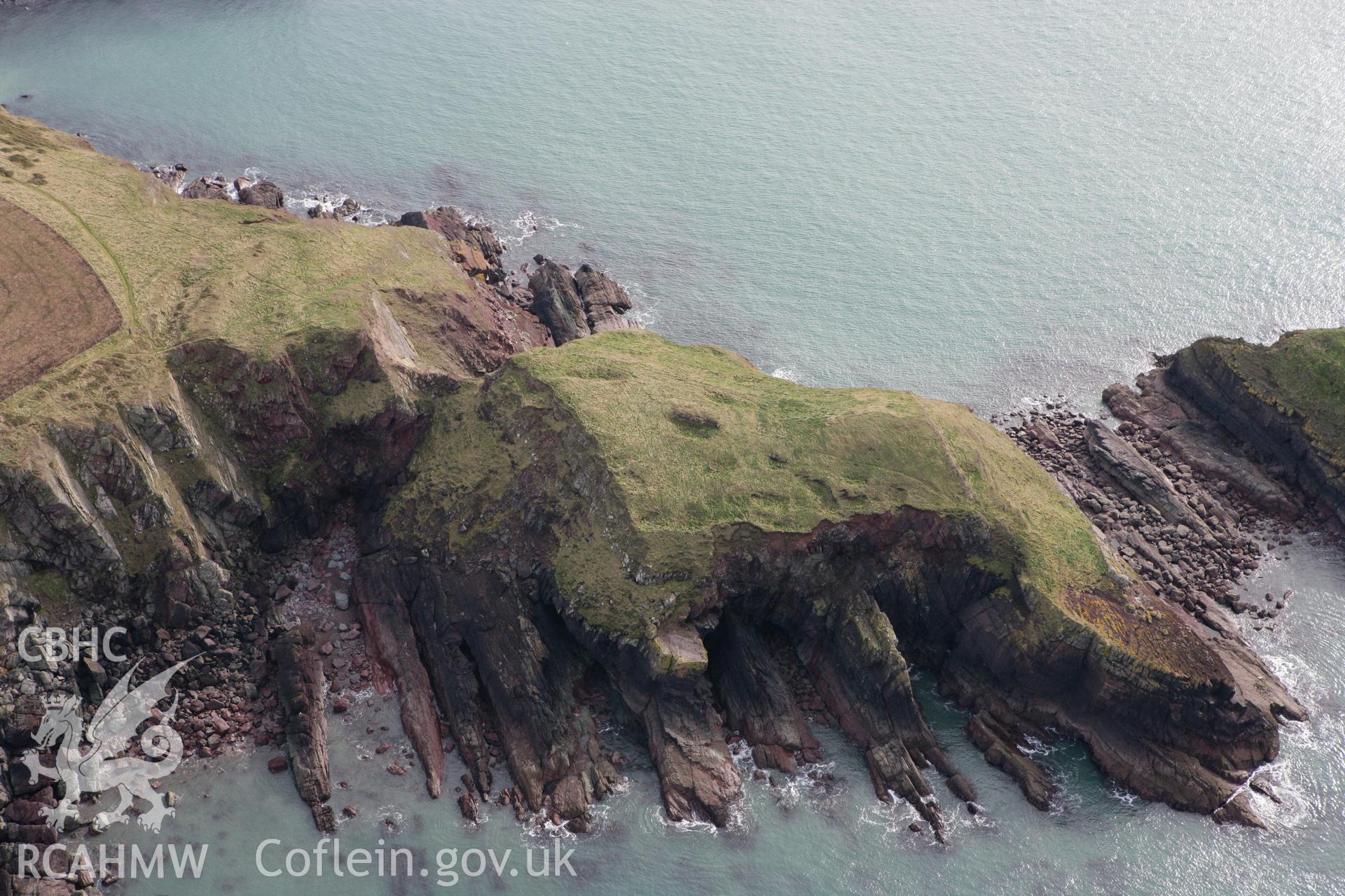 RCAHMW colour oblique aerial photograph of Sheep Island Promontory Fort. Taken on 02 March 2010 by Toby Driver